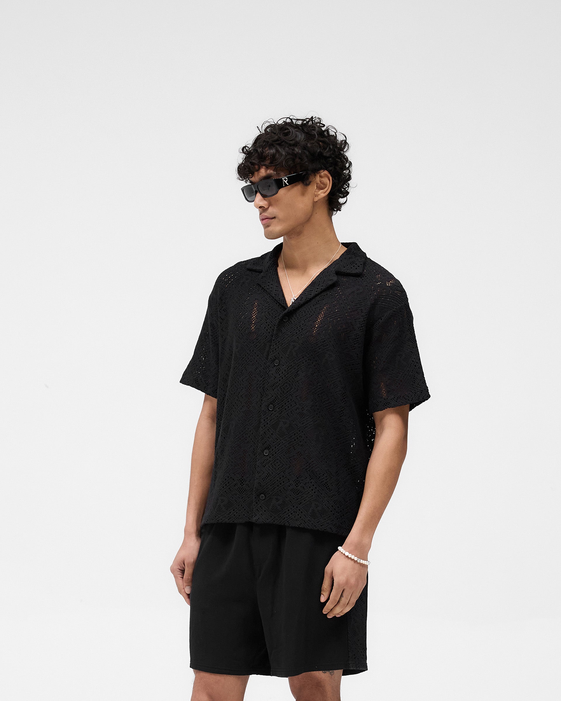 Back product image of a mens black crochet shirt on a plain white background | All Over Crochet Shirt in Jet Black | Oversized fit crochet shirt with 