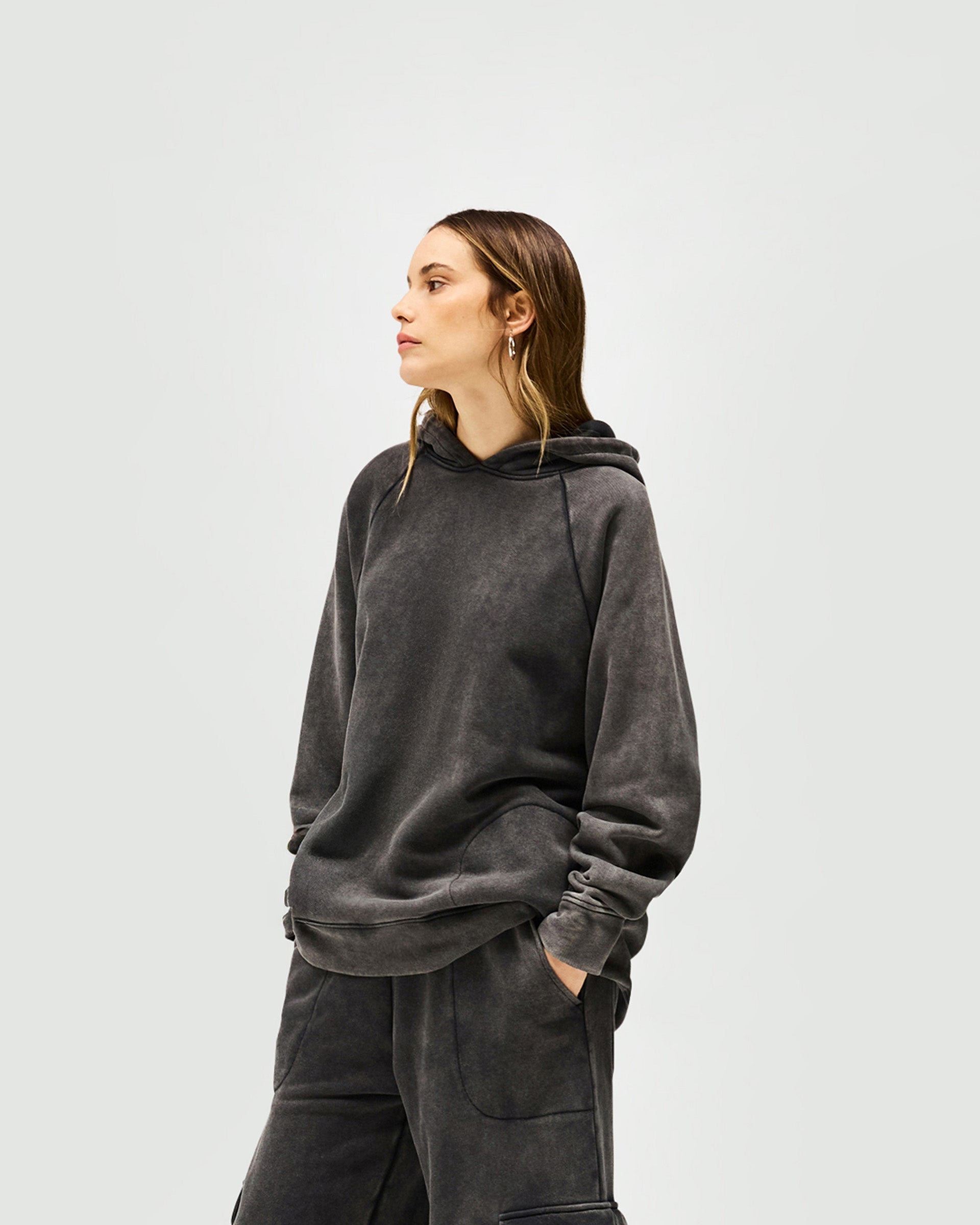 Back product image of a womens charcoal hoodie on a plain white background | Monster Hoodie in Charcoal | Oversized hoodie with dropped sleeves and embroidered branding | Womens SS25 Hoodies | Represent Clo