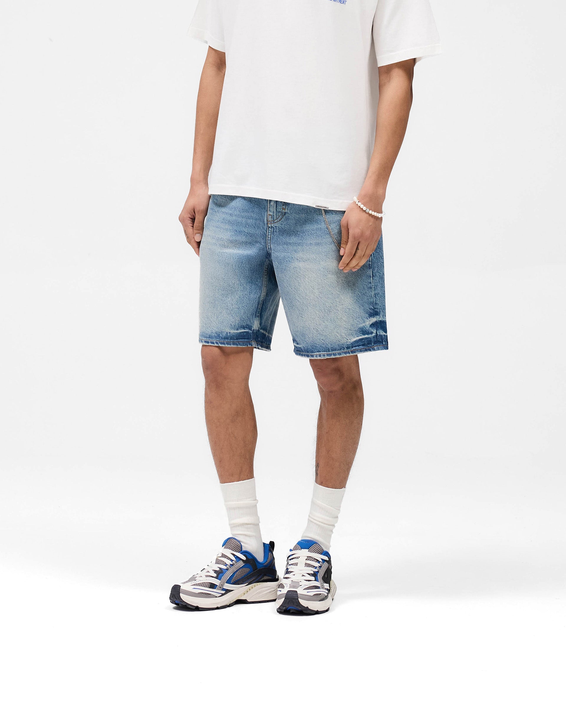 Back product image of mens blue denim shorts on a plain white background | R10T Tailored Denim Shorts in Blue 60 | Denim shorts with vintage inspired faded wash | SS25 Denim | Represent Clo