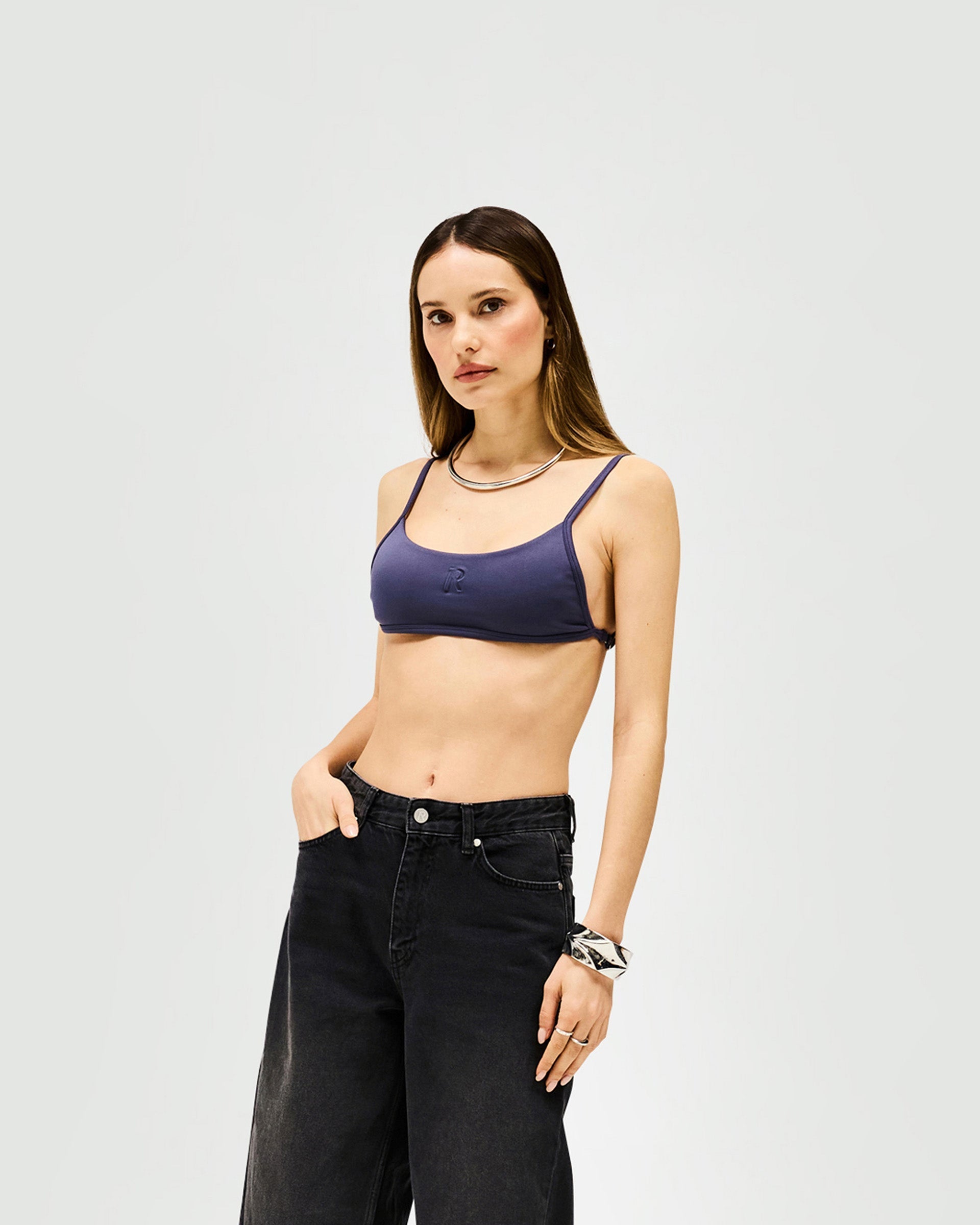 Back product image of a womens grey bralette on a plain white background | Control Bralette in Graphite | Bib front bralette in compact neoprene | Womens SS25 Tops | Represent Clo
