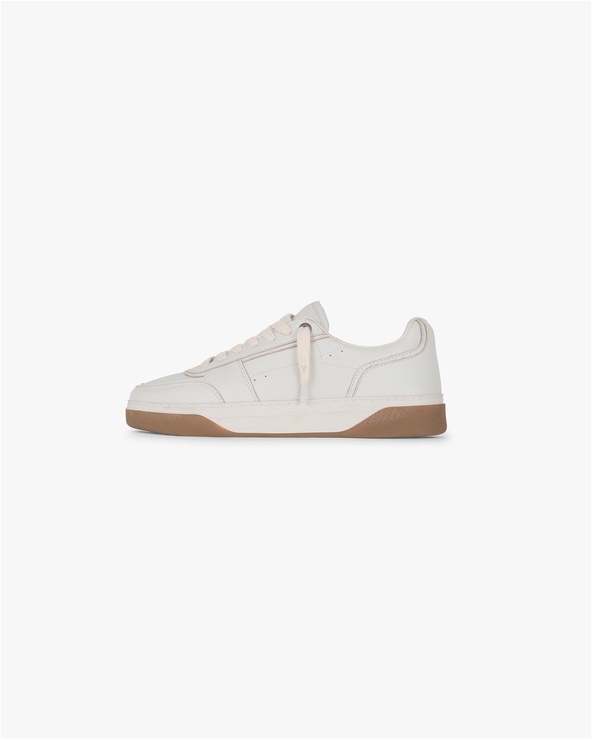 Front product image of a mens white leather sneaker on a plain white background | Initial Sneaker in Vintage White Gum | Leather sneakers with perforated toe and embossed branding | SS25 Footwear | Represent Clo
