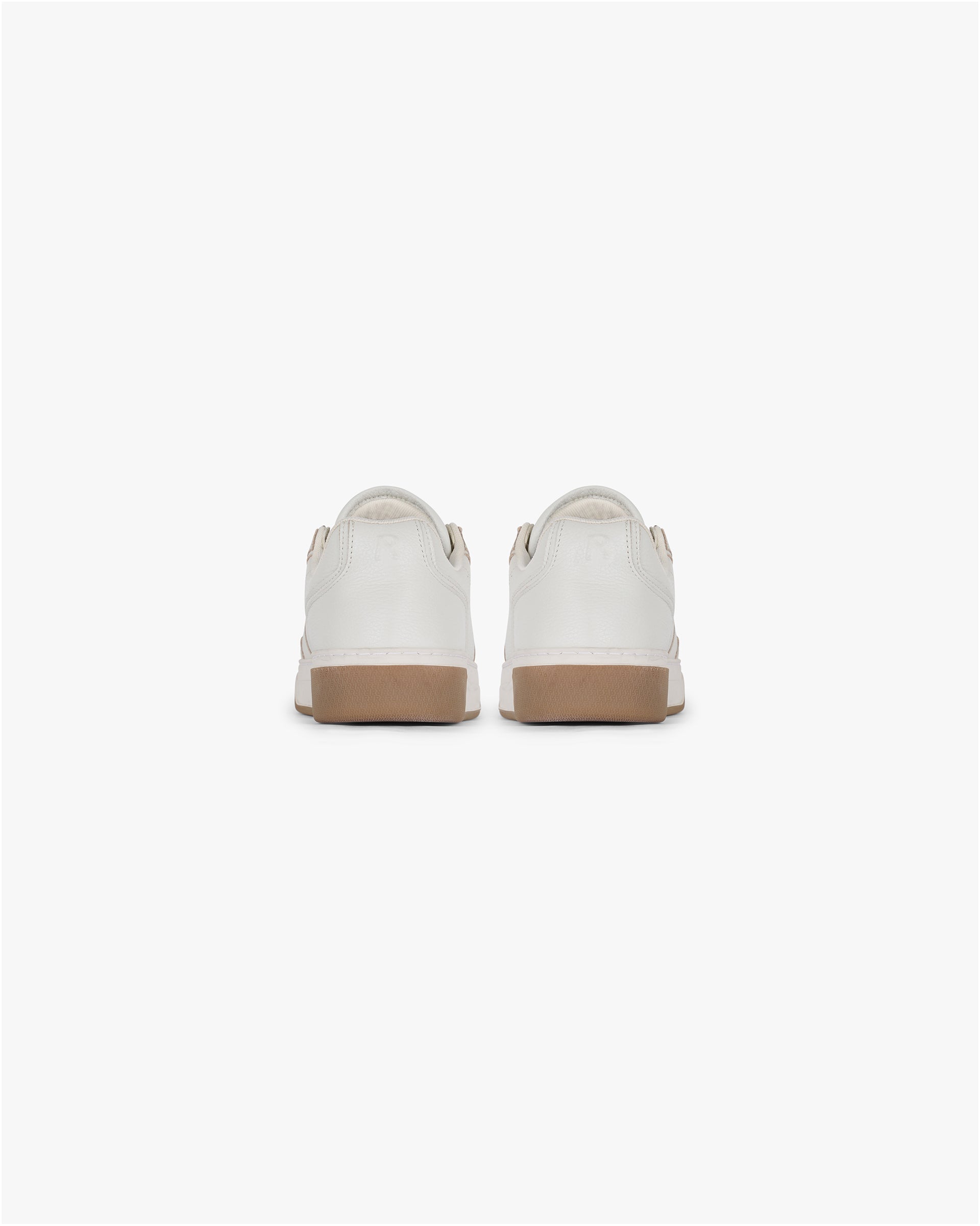 Product image of a mens white leather sneaker on a plain white background | Initial Sneaker in Vintage White Gum | Leather sneaker with perforated toe detailing | SS25 Footwear | Represent Clo
