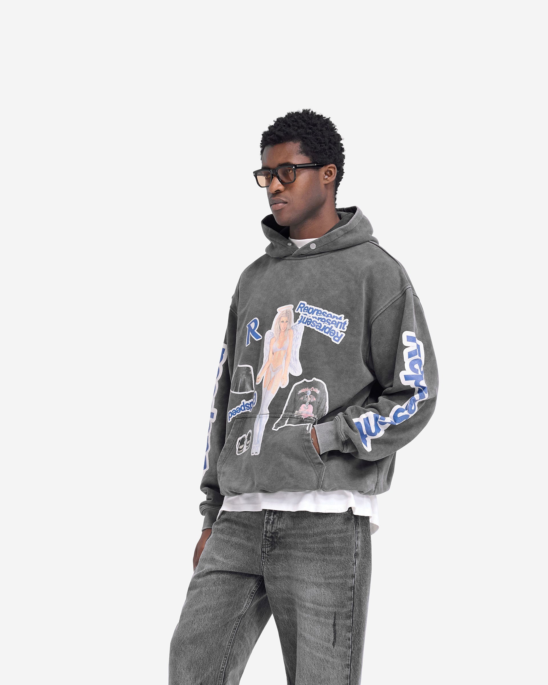 Man wearing a grey hoodie on a plain white background | Question Your Innocence Hoodie in Vintage Grey | Slightly oversized hoodie with cracked print graphic | FW24 Hoodies | Represent Clo