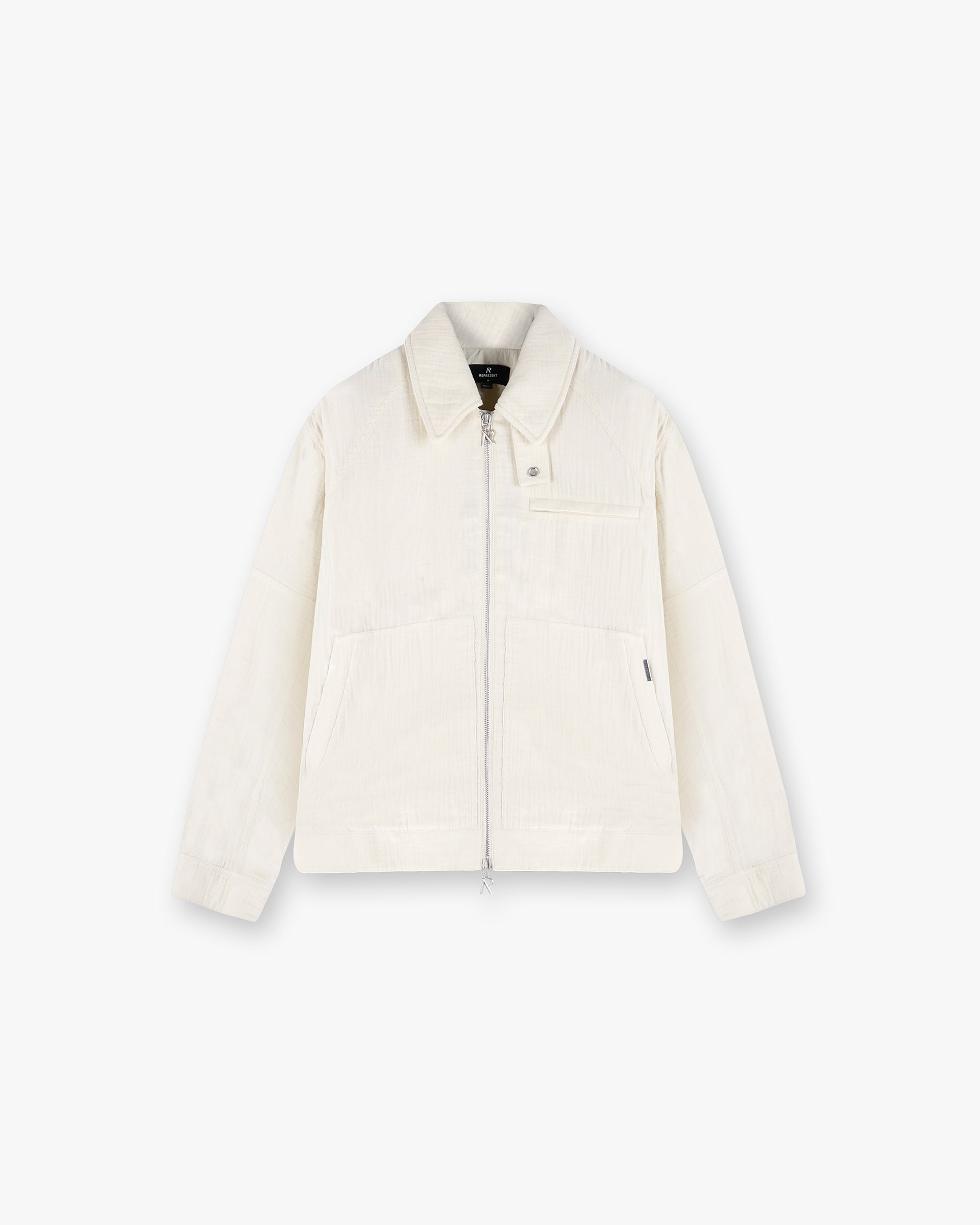 Front product image of a mens blue cotton jacket on a plain white background | Crinkle Trucker Jacket in Ecru | Cotton outerwear jacket | SS25 Outerwear | Represent Clo
