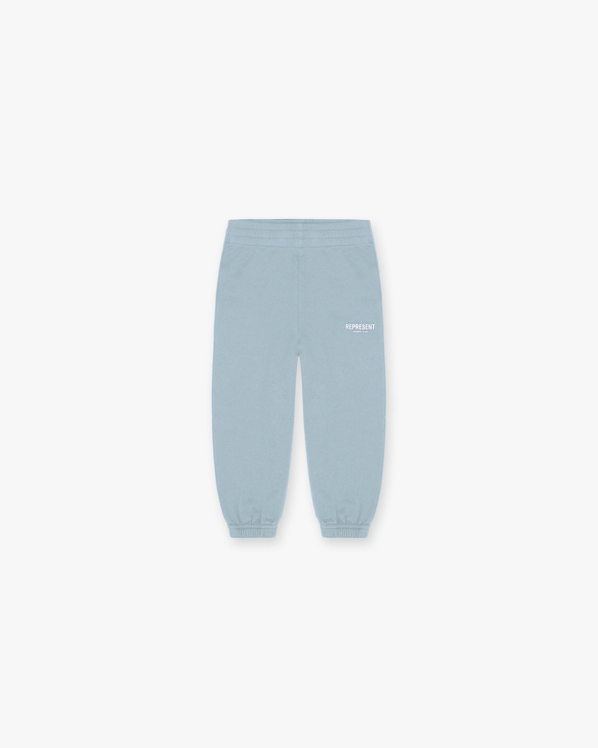 Front product image of a kids blue sweatpants on a plain white background | Represent Mini Owners Club Sweatpants in Powder Blue | Comfortable childrens sweatpants | Owners Club Pants | Represent Clo