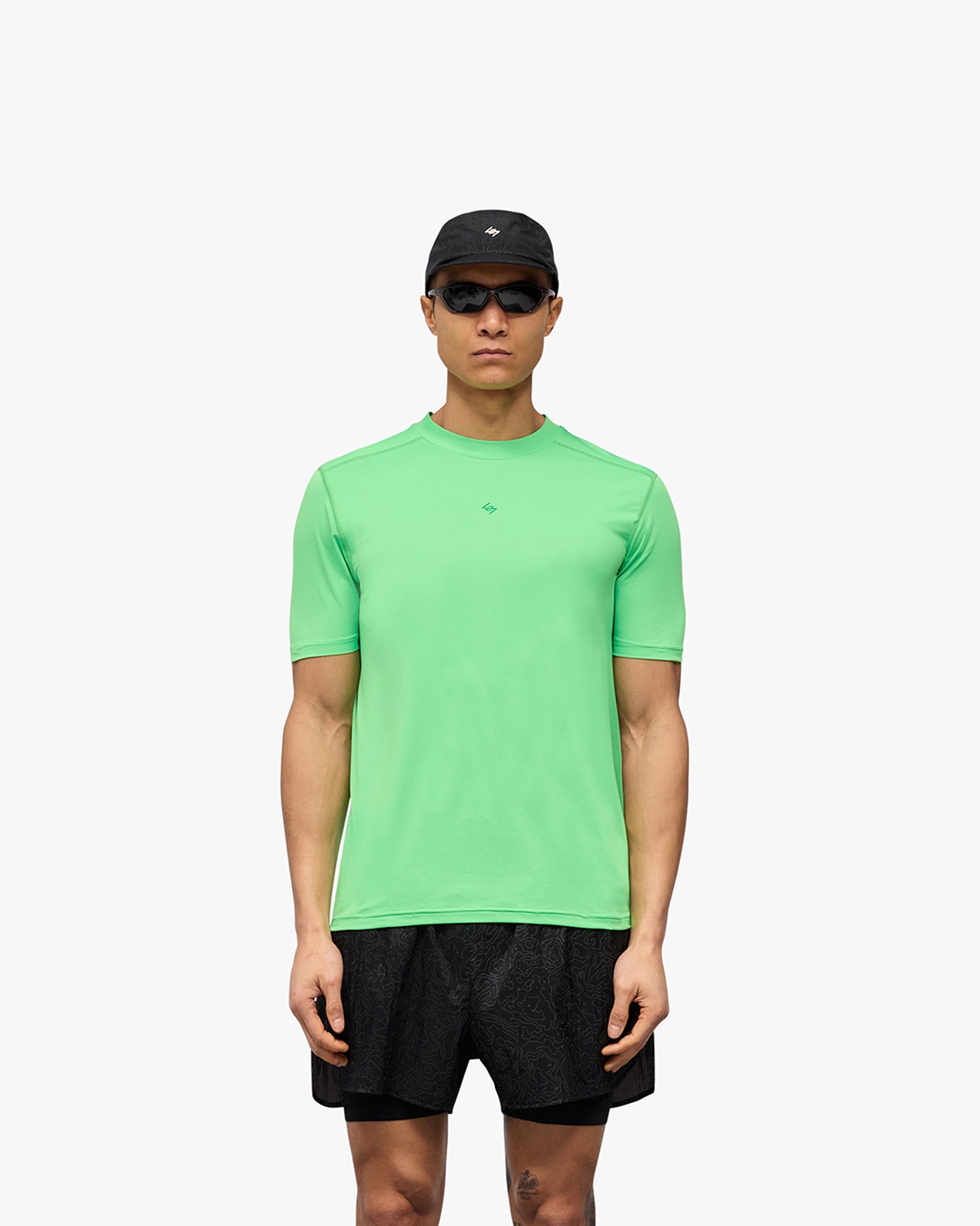 Man wearing a green t-shirt on a plain white background | 247 Contour Run T-Shirt in Speed Green | Breathable and sweat-wicking running t-shirt | 247 T-Shirts | Represent Clo