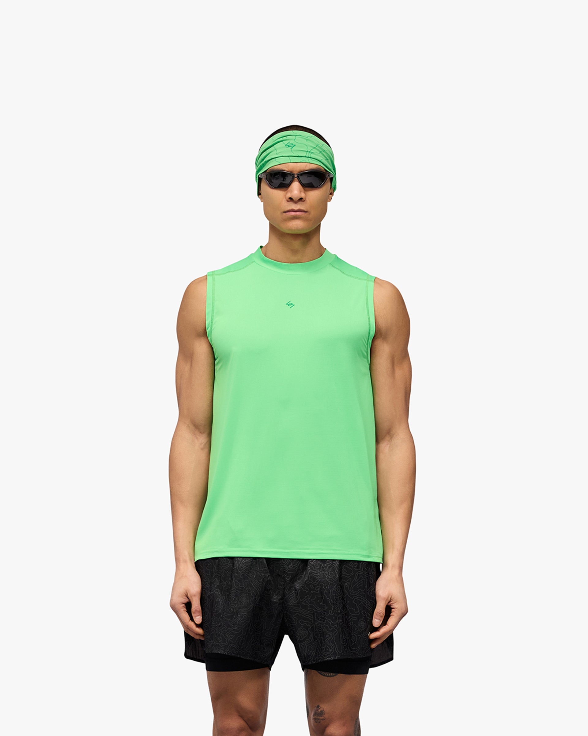Man wearing a green running tank on a plain white background | 247 Contour Run Tank in Speed Green | Breathable and sweat-wicking running tank | 247 T-Shirts | Represent Clo
