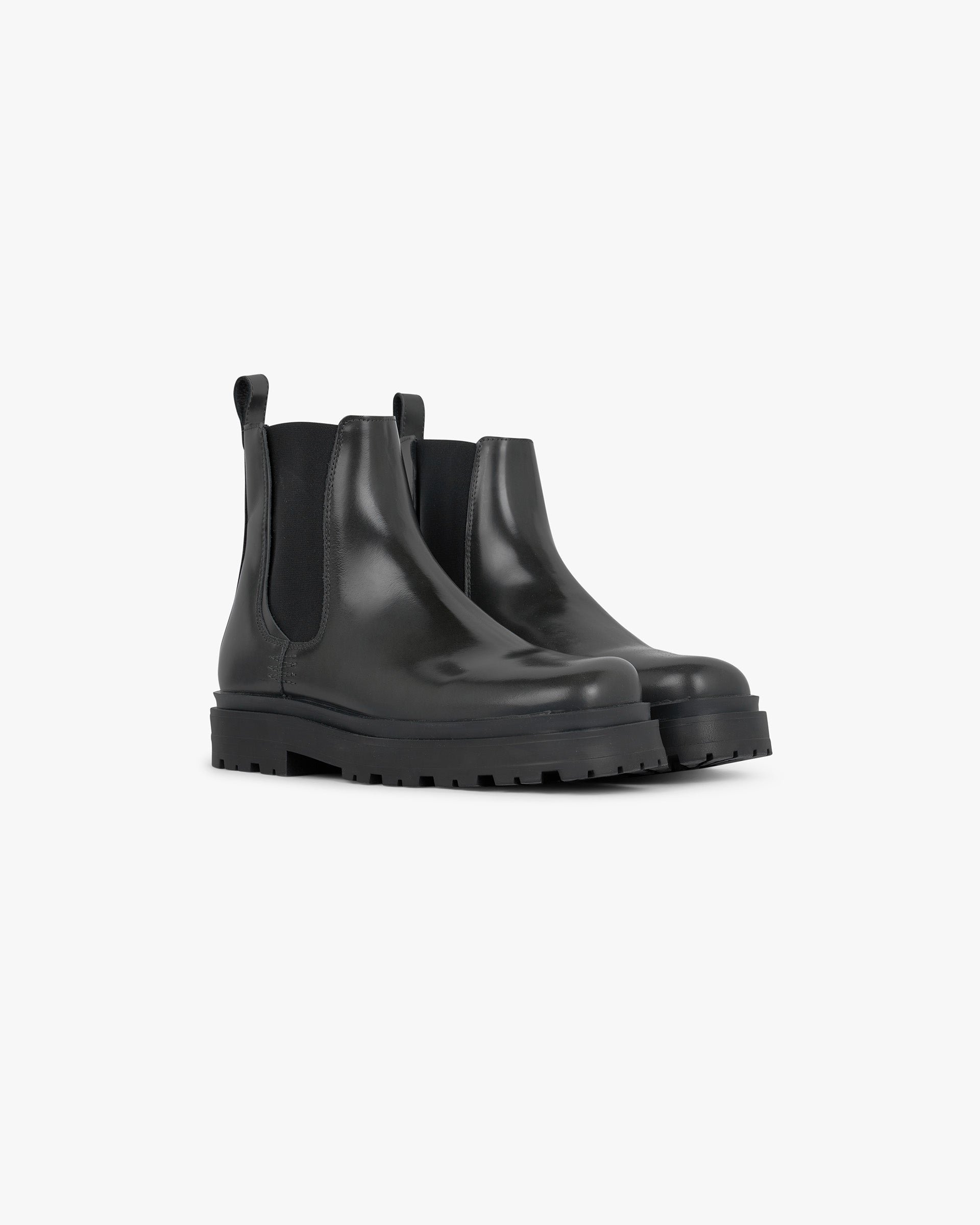 Back product image of mens black leather boot on a plain white background | Work Boot Pull Up Leather in Off Black | Leather boot with elastic gusset and rubber outsole | PRE SS25 Footwear | Represent Clo