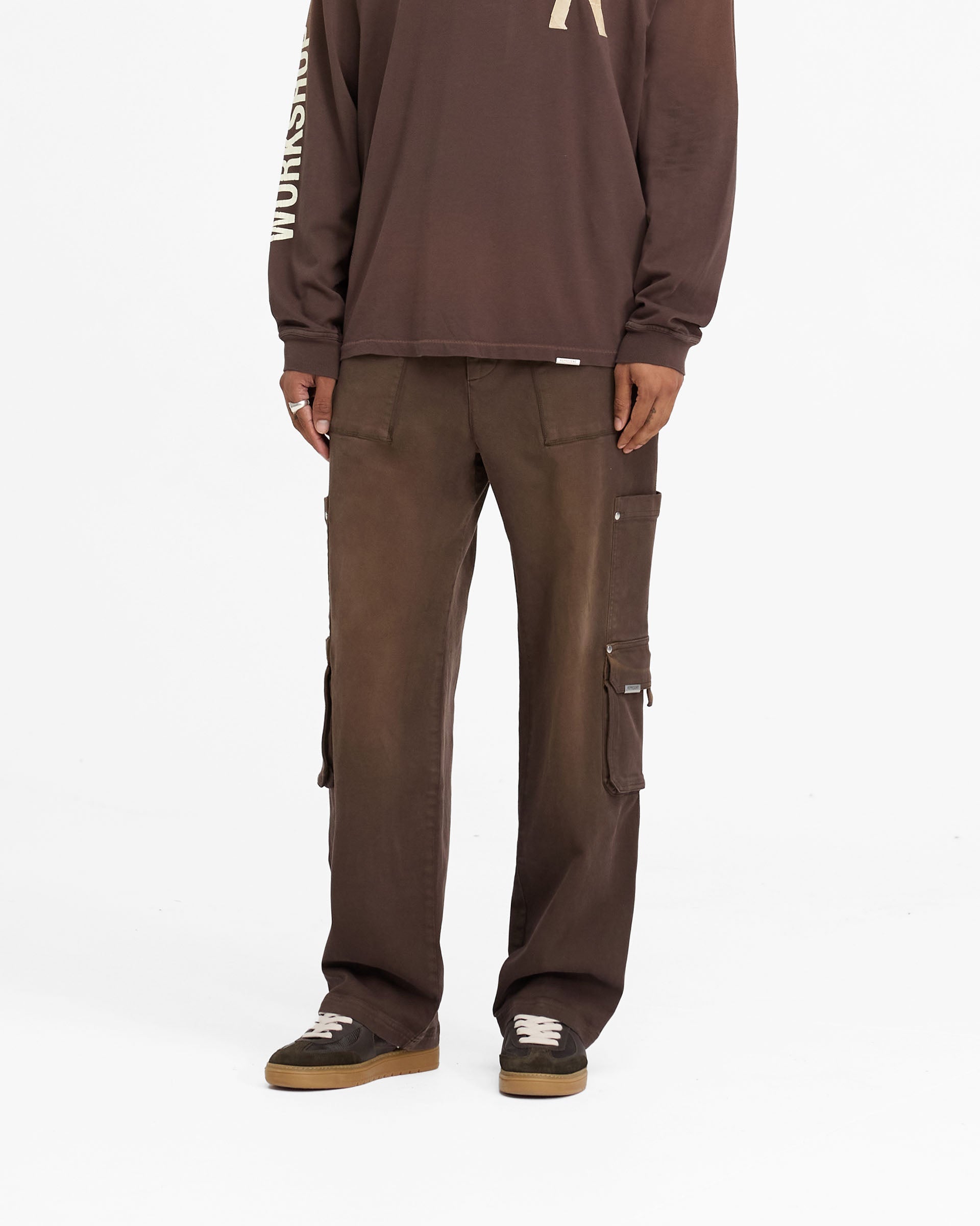 Back product image of mens brown pants on a plain white background | Workshop Pant in Cedar | Pants with 3D cargo and flap patch pockets | FW24 Pants | Represent Clo