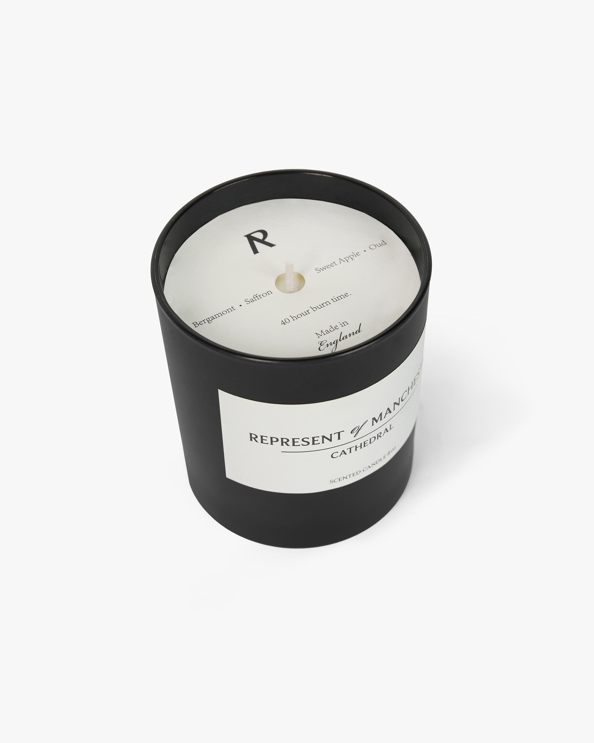 Back product image of a mens black candle on a plain white background | Manchester Store Candle in Matte Black | Scented candle with notes of bergamot and oud | Exclusives Accessories | Represent Clo