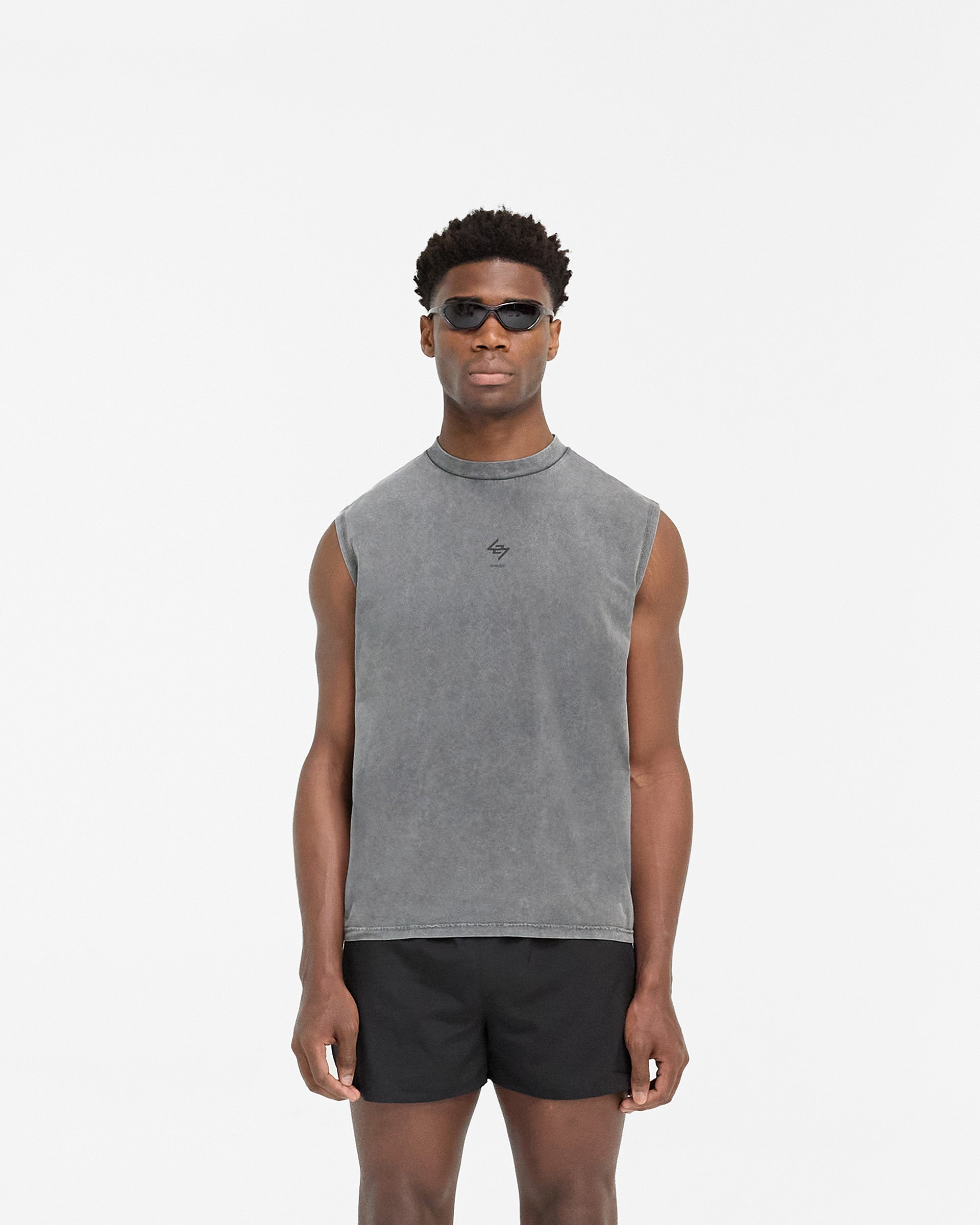 Man wearing a grey tank top on a plain white background | 247 Oversized Tank in Pewter | Oversized tank with 4-way stretch and antibacterial finish | 247 T-Shirts | Represent Clo