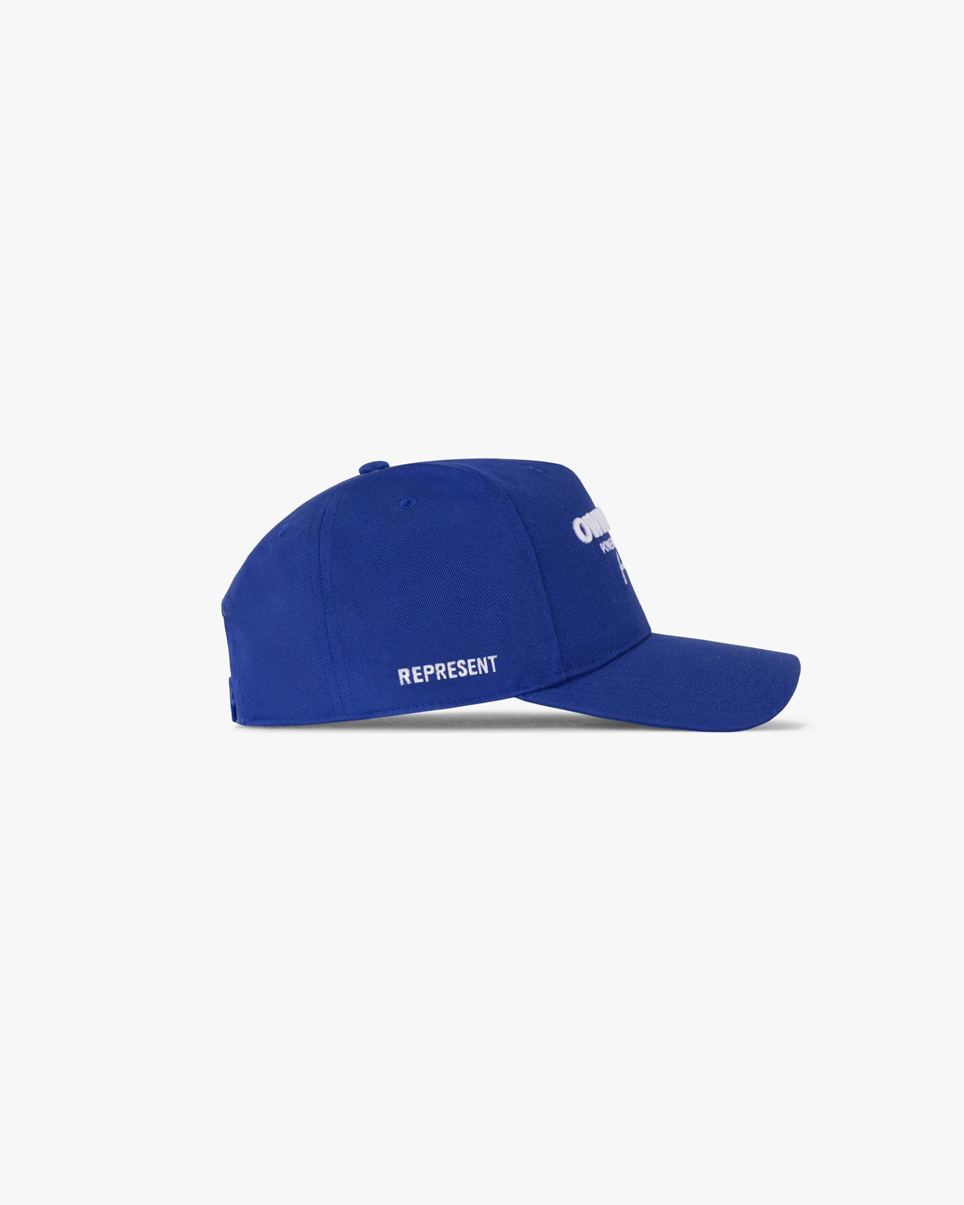 Back product image of a mens blue snapback cap on a plain white background | Represent Owners Club Cap in Cobalt | Embroidered Owners Club branding | Owners Club Accessories | Represent Clo