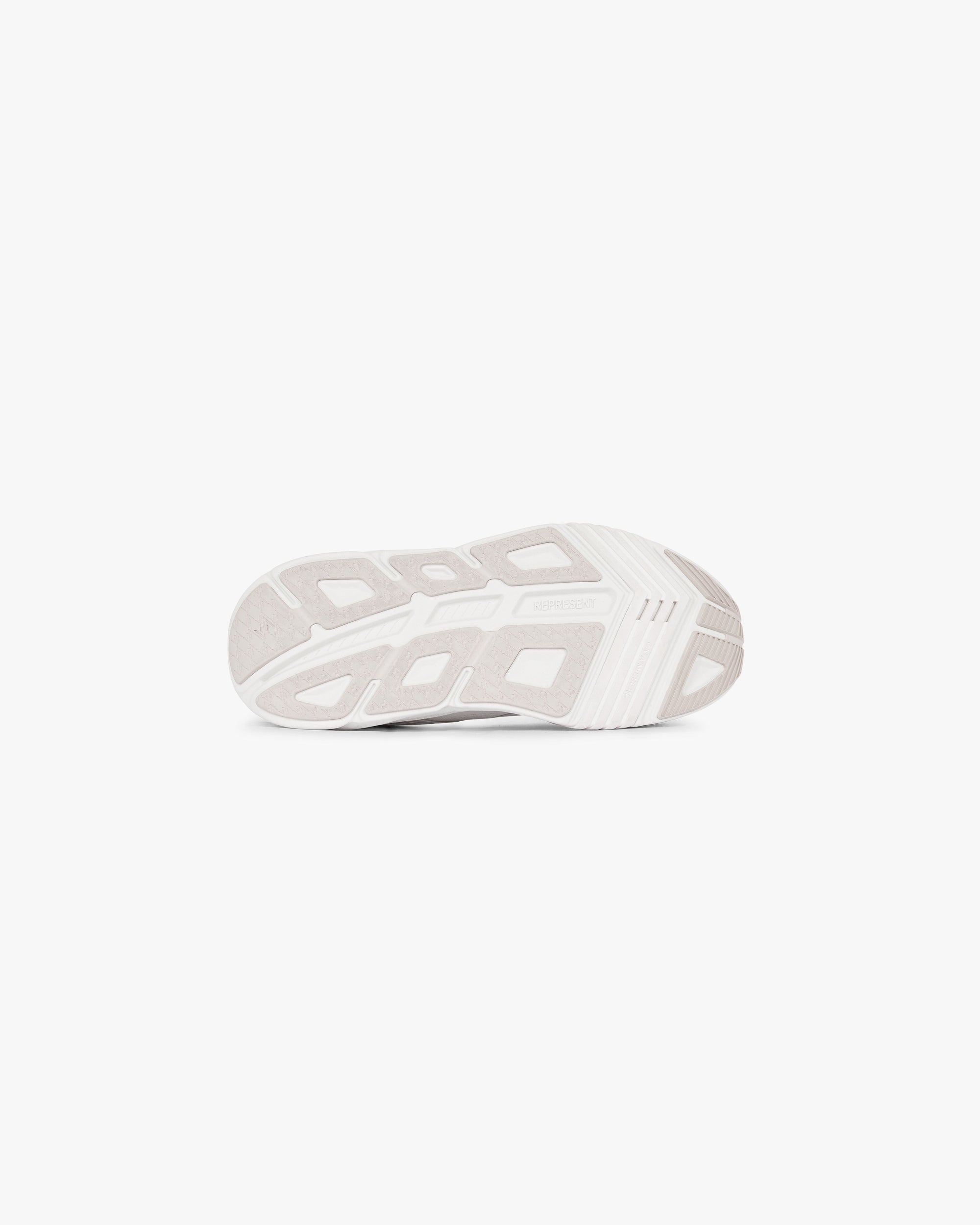 Back product image of a mens white running shoe on a plain white background | 247 Arc-1 Runner in Flat White | Running shoe with engineered mesh upper | 247 Footwear | Represent Clo