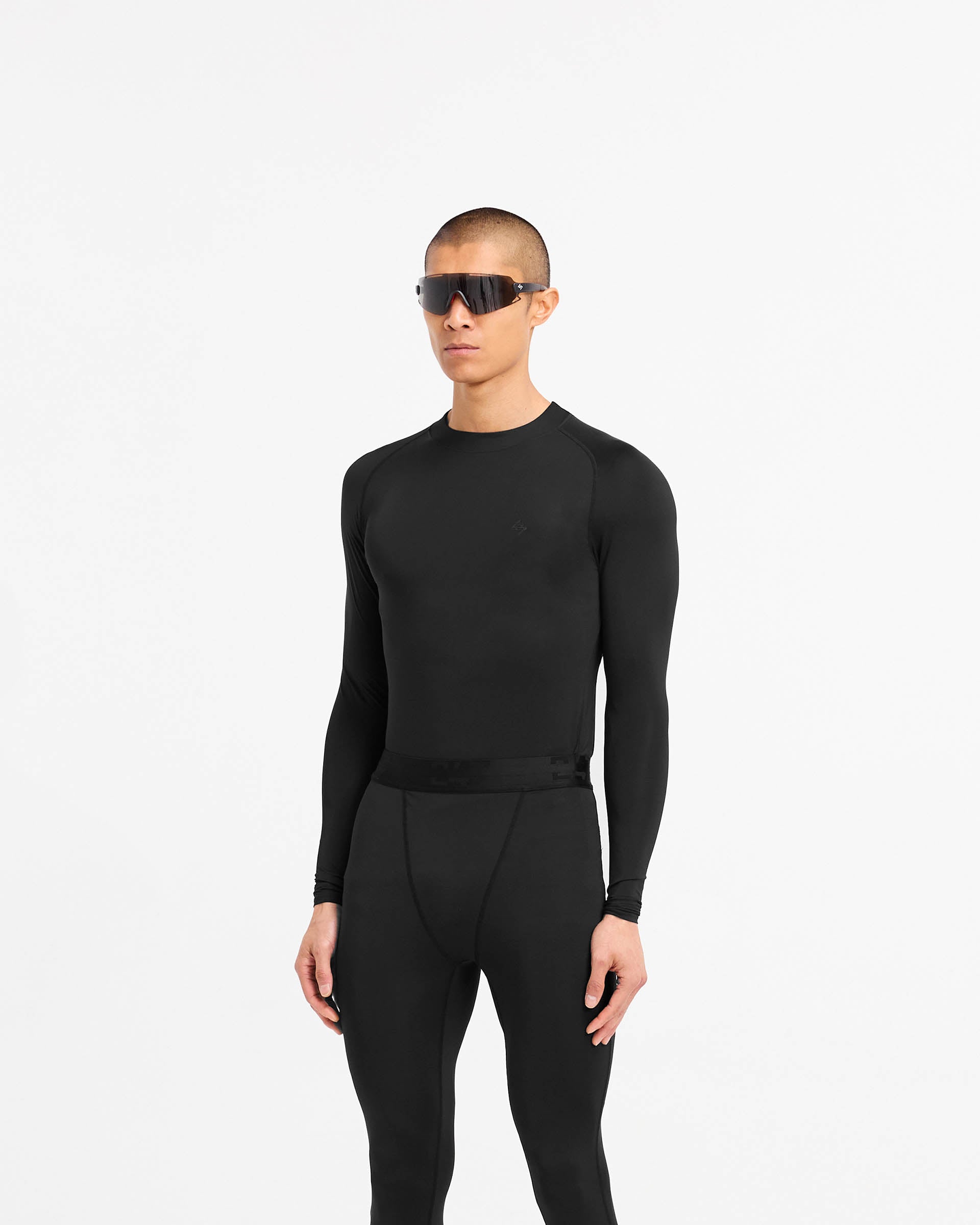 Back product image of a mens black long sleeve t-shirt on a plain white background | 247 Compound Long Sleeve T-Shirt in Black | Antibacterial long sleeves with external flatlock stitching | 247 T-Shirts | Represent Clo