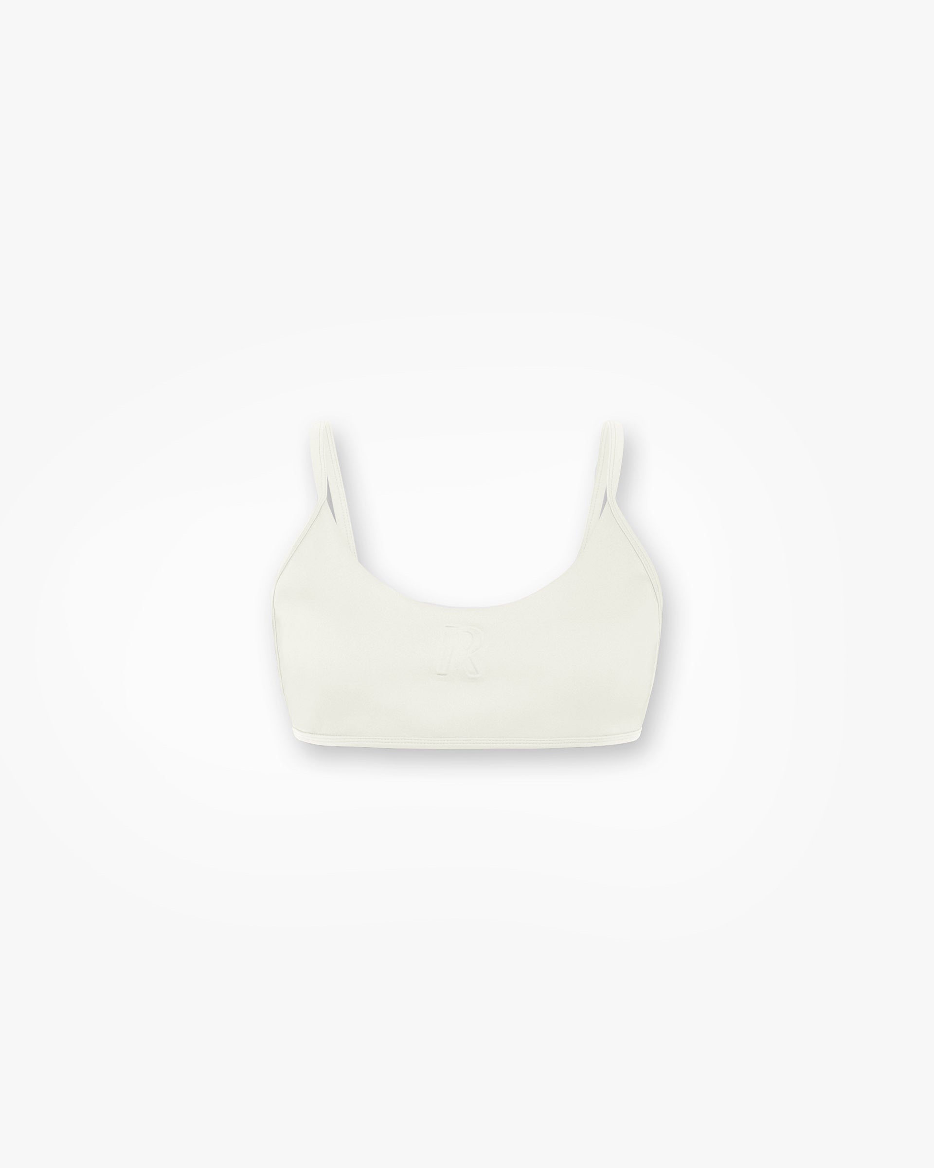 Front product image of a womens white bralette on a plain white background | Control Bralette in Warm White | Polyester and elastane bralette | Womens SS25 Tops | Represent Clo