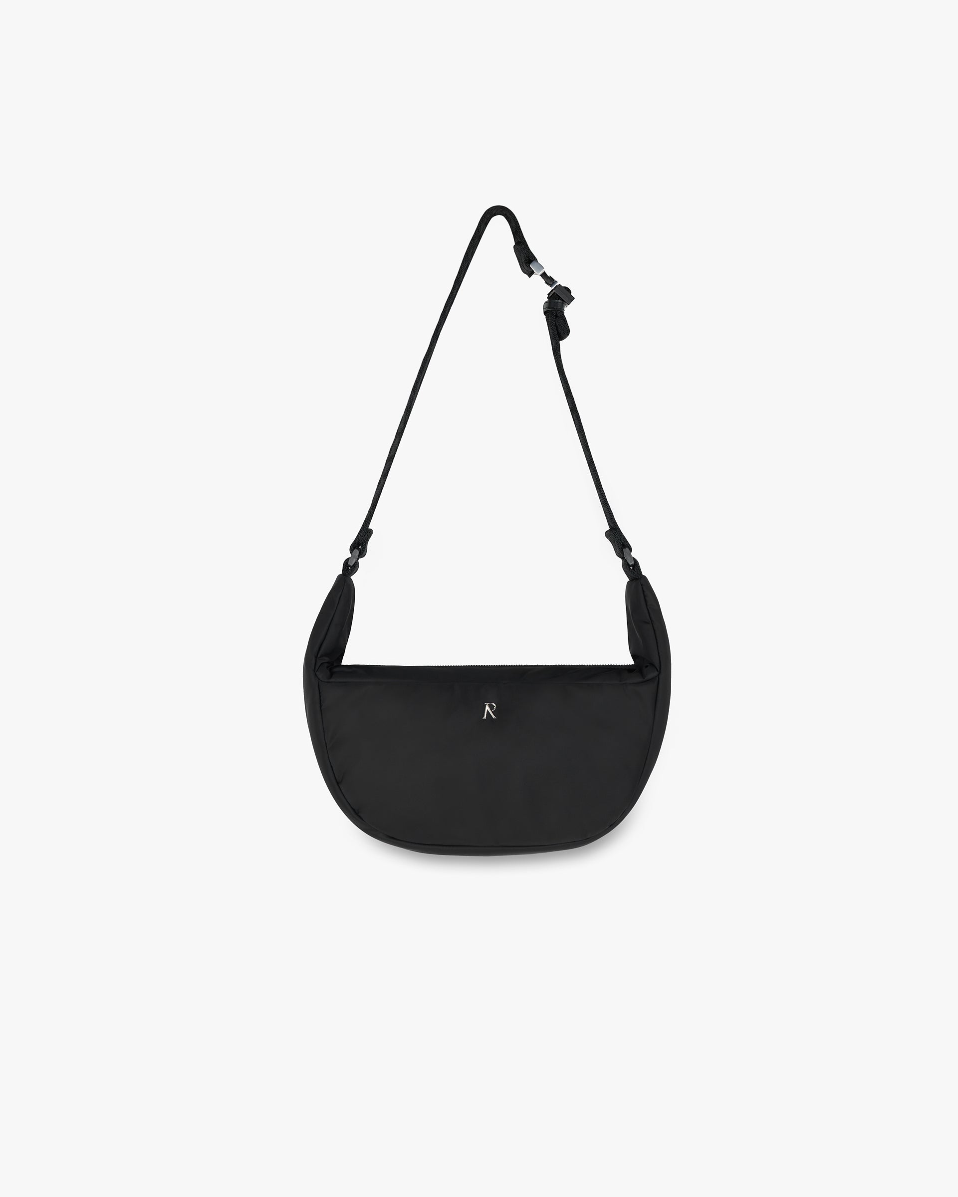 Back product image of a mens black sling bag on a plain white background | Initial Nylon Sling Bag in Black | Sling bag with adjustable strap and internal zip pocket | FW24 Accessories | Represent Clo