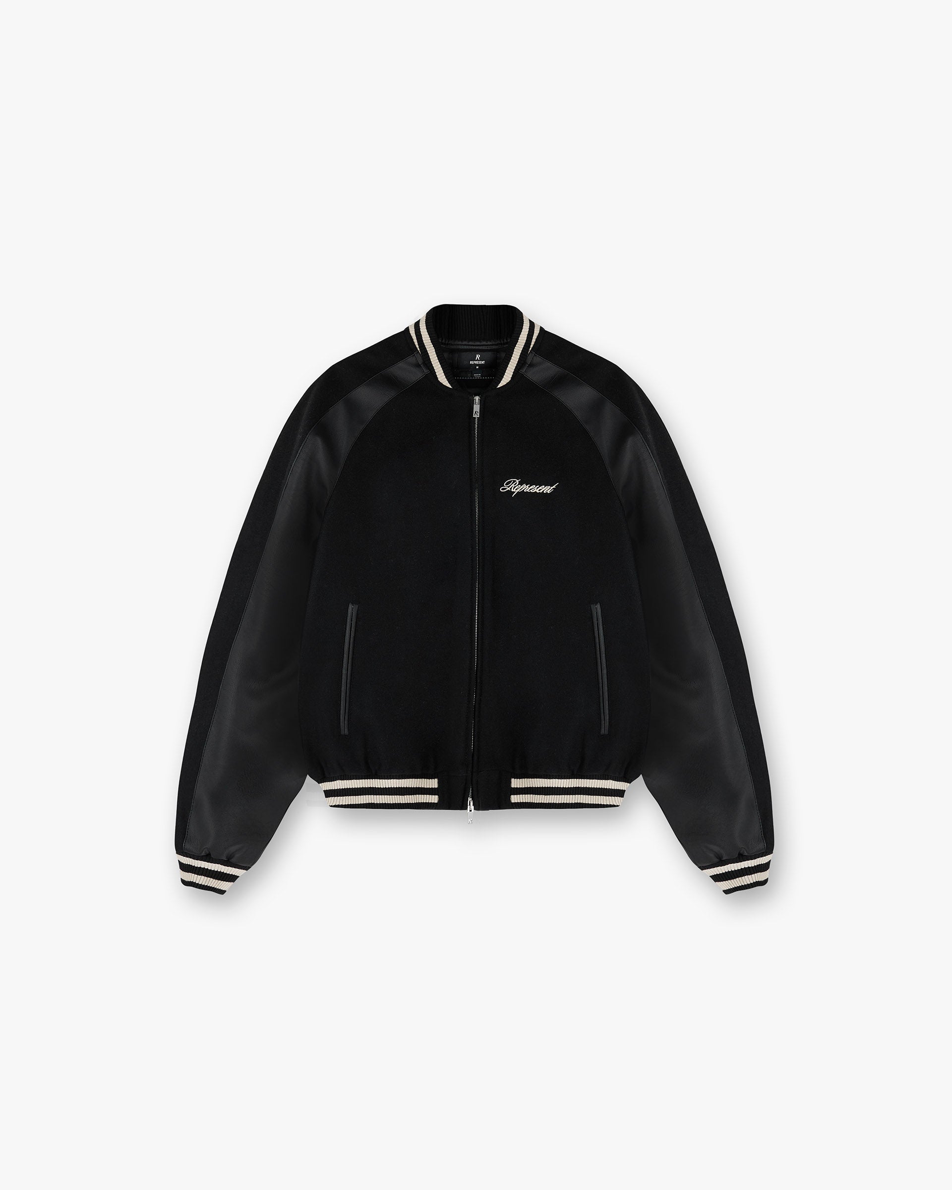 Front product image of a mens black jacket on a plain white background | Raglan Varsity Jacket in Black | Varsity jacket with raglan sleeves | SS25 Outerwear | Represent Clo