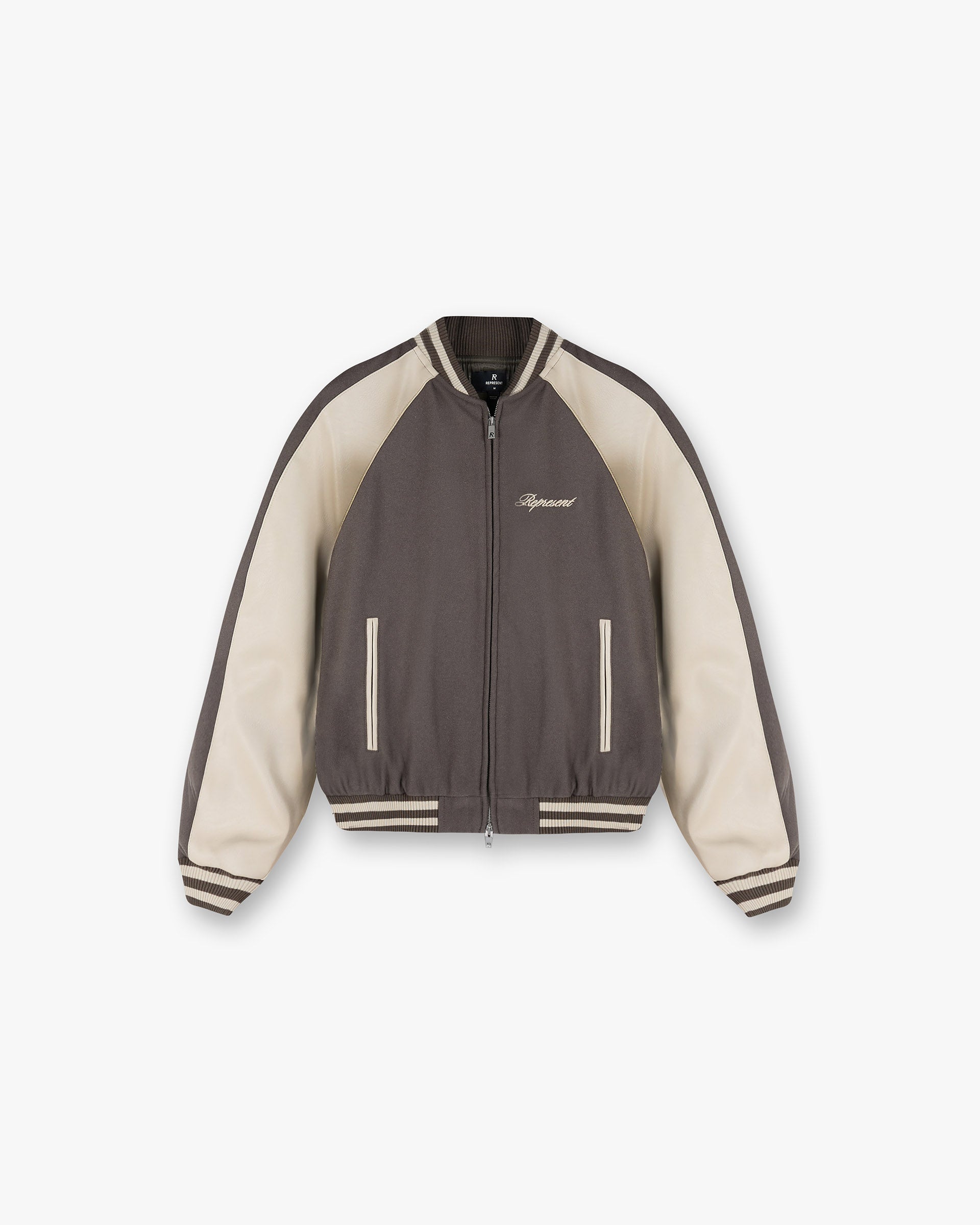 Front product image of a mens stone jacket on a plain white background | Raglan Varsity Jacket in Stone | Varsity style outerwear with raglan sleeves | SS25 Outerwear | Represent Clo