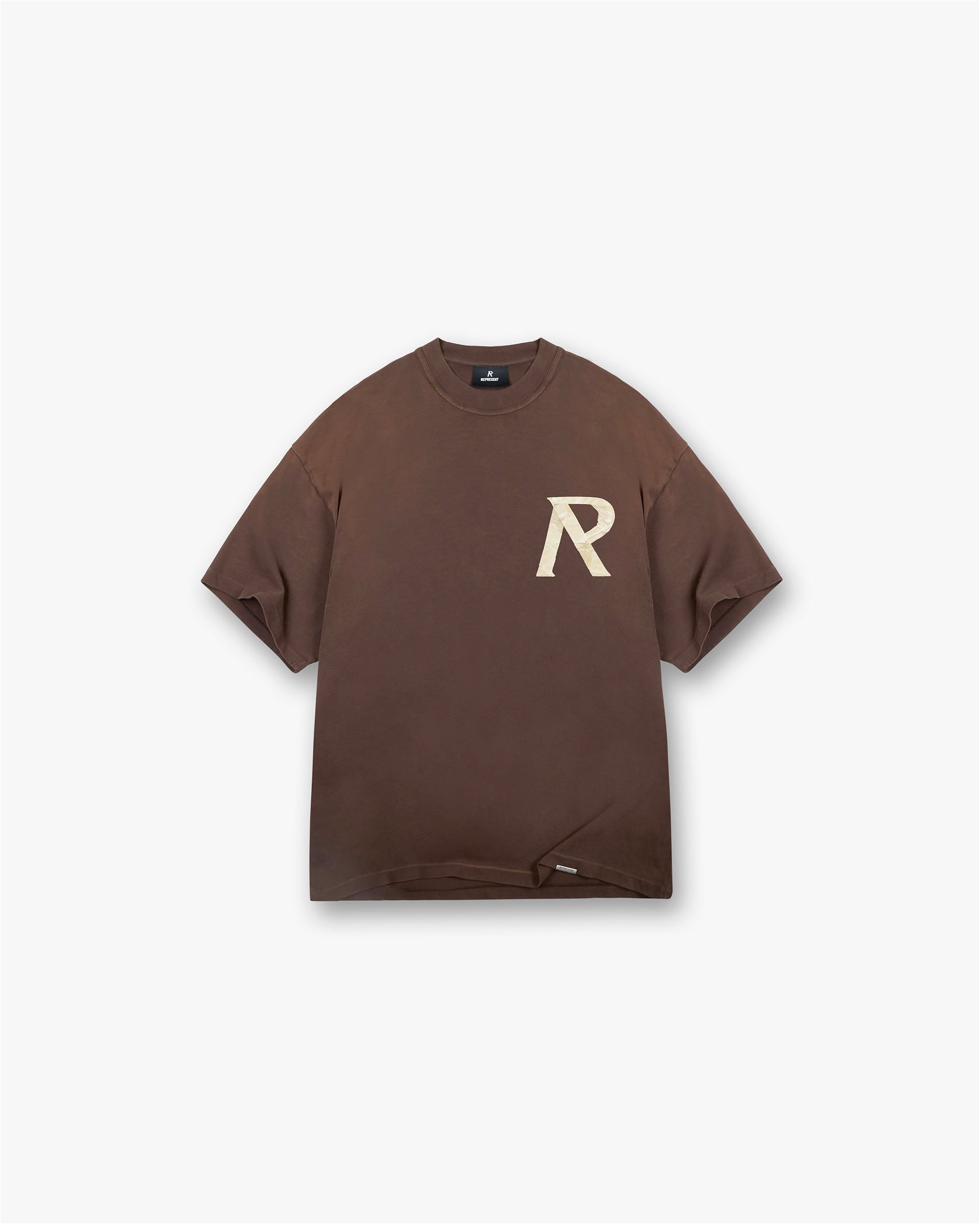 Front product image of a mens fawn t-shirt on a plain white background | Masking Tape Initial T-Shirt in Cedar | Slightly oversized t-shirt with distressed applique | FW24 T-Shirts | Represent Clo