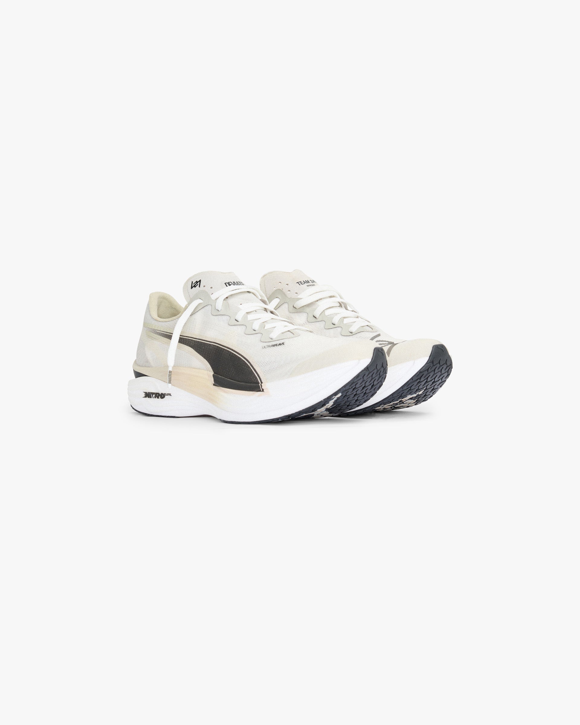 Back product image of womens brown running shoes on a plain white background | 247 X Puma Deviate Nitro 3 Elite Women's in Desert Dust | Lightweight running footwear with PWRPLATE for stability | 247 Footwear | Represent Clo