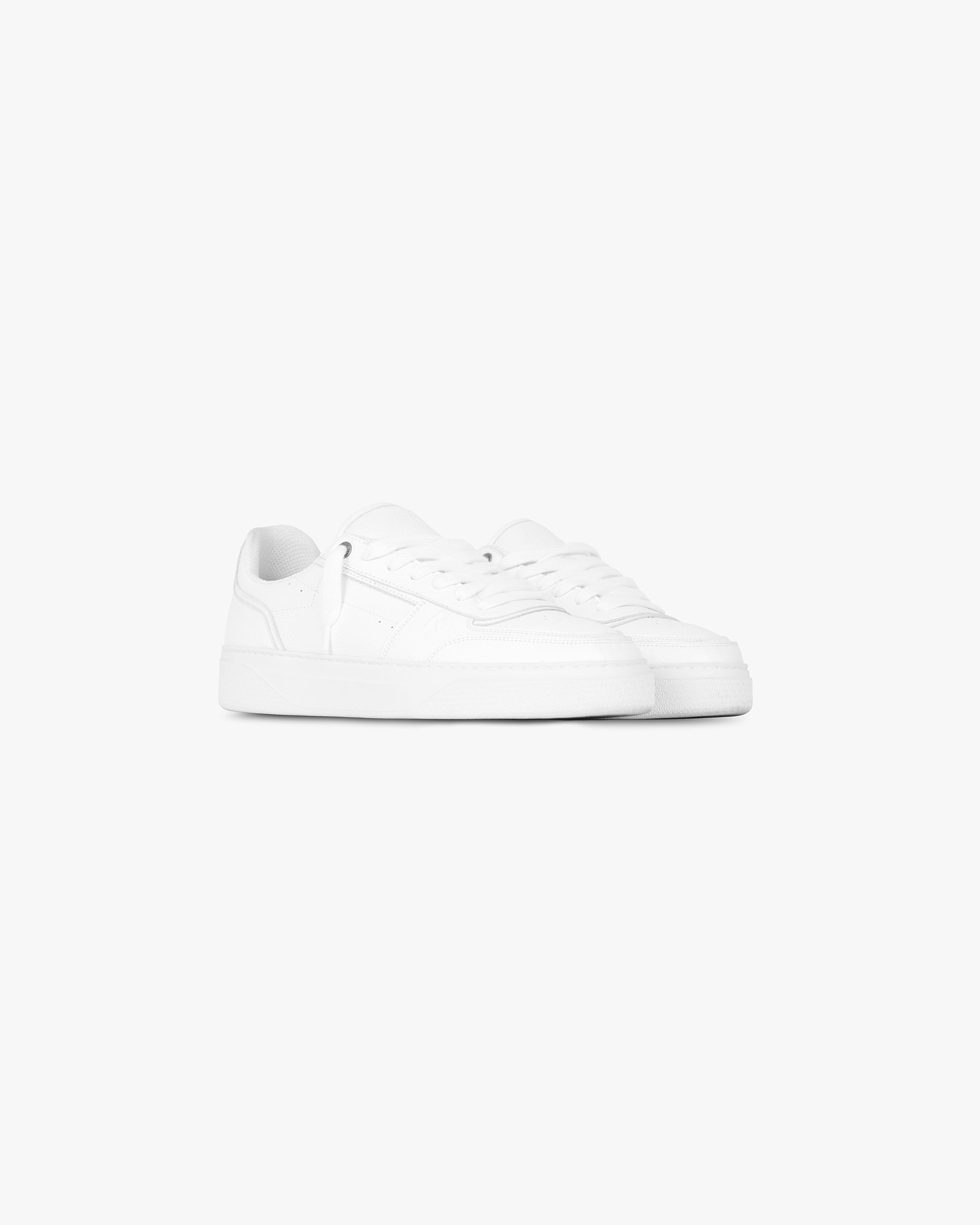 Back product image of mens white leather sneakers on a plain white background | Initial Sneaker in Flat White | Leather sneakers with perforated toe and rubber midsole | FW24 Footwear | Represent Clo