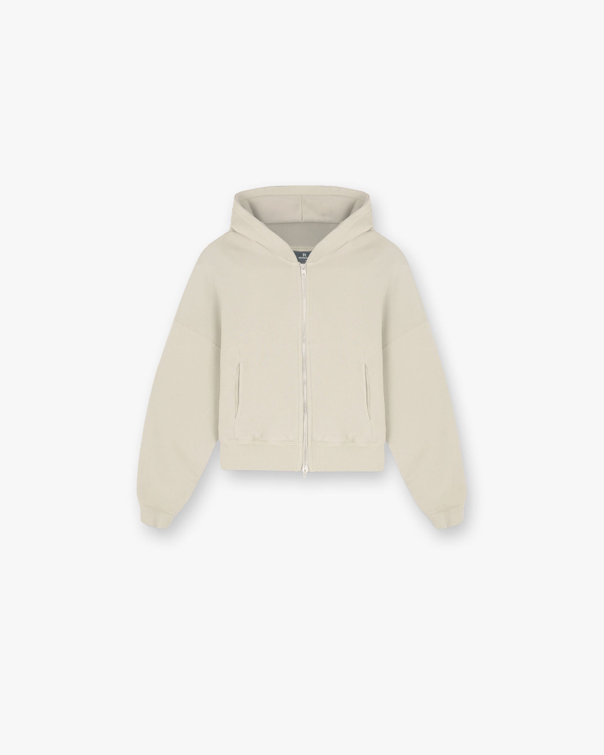 Front product image of a womens grey oversized crop hoodie on a plain white background | Initial Oversized Crop Hoodie in Storm | Cropped hoodie with oversized fit | Womens Initial Hoodies | Represent Clo