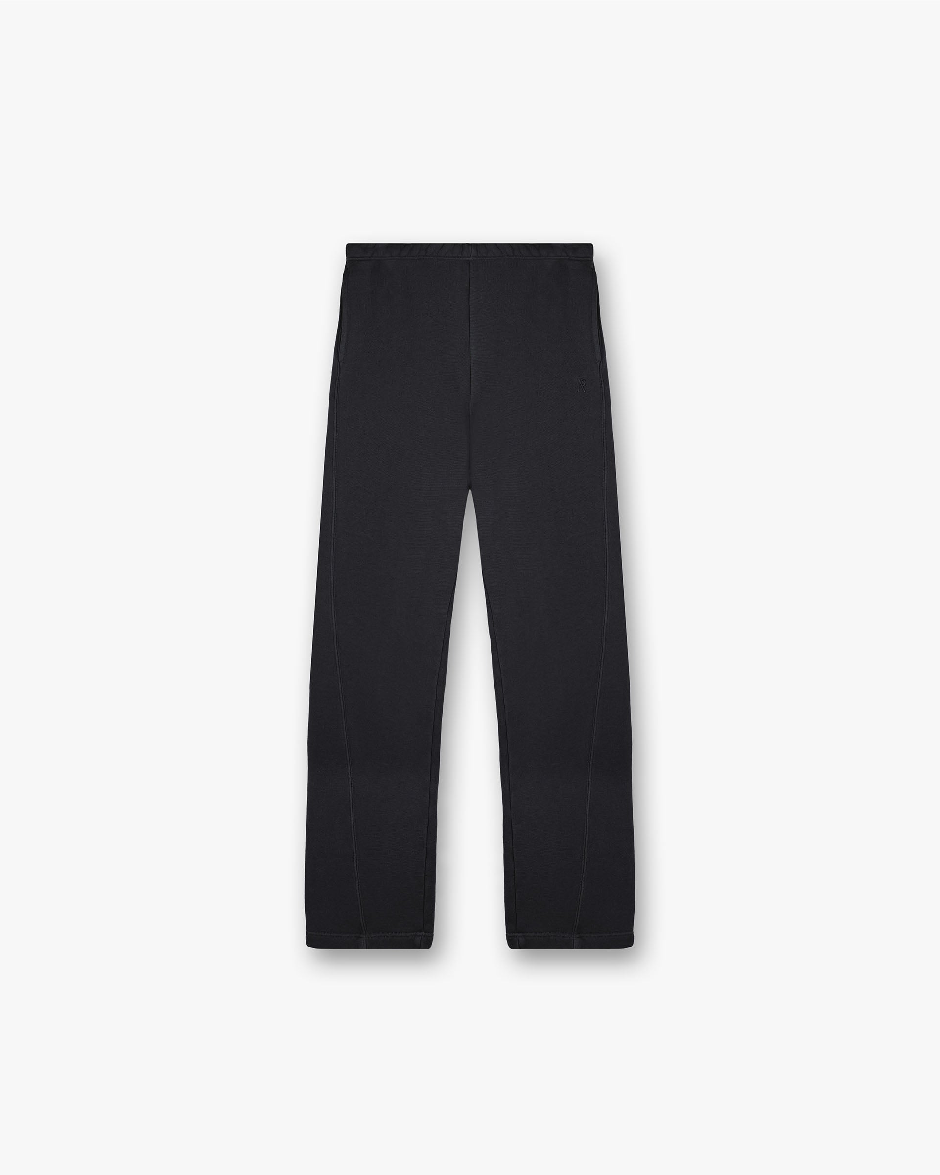 Front product image of a womens black jogger on a plain white background | Initial Twisted Seam Jogger in Washed Black | Joggers with twisted seam design | Womens Initial Bottoms | Represent Clo