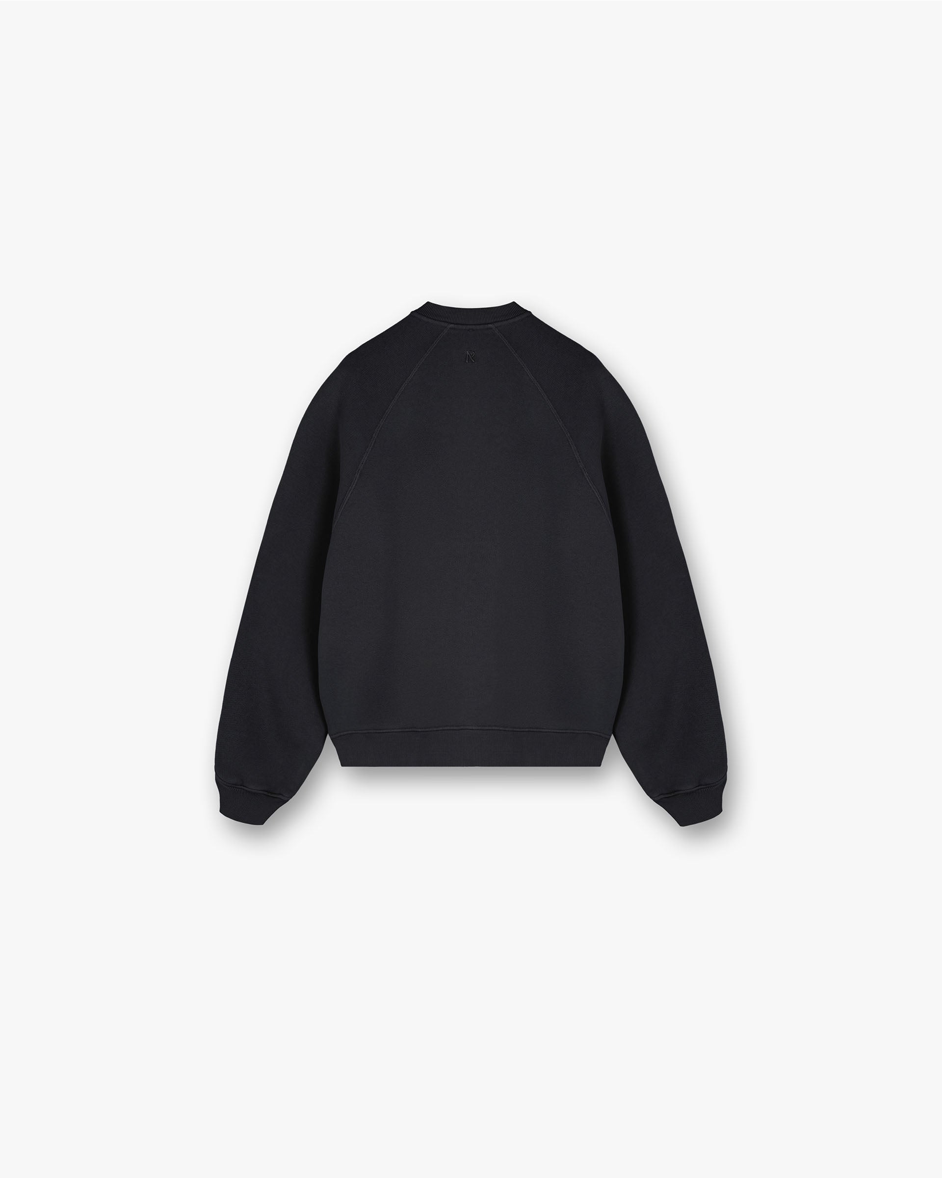 Back product image of a womens black sweater on a plain white background | Initial V Notch Sweater in Washed Black | Heavyweight cotton sweater with ribbed cuffs and hem | Womens Initial Sweaters | Represent Clo