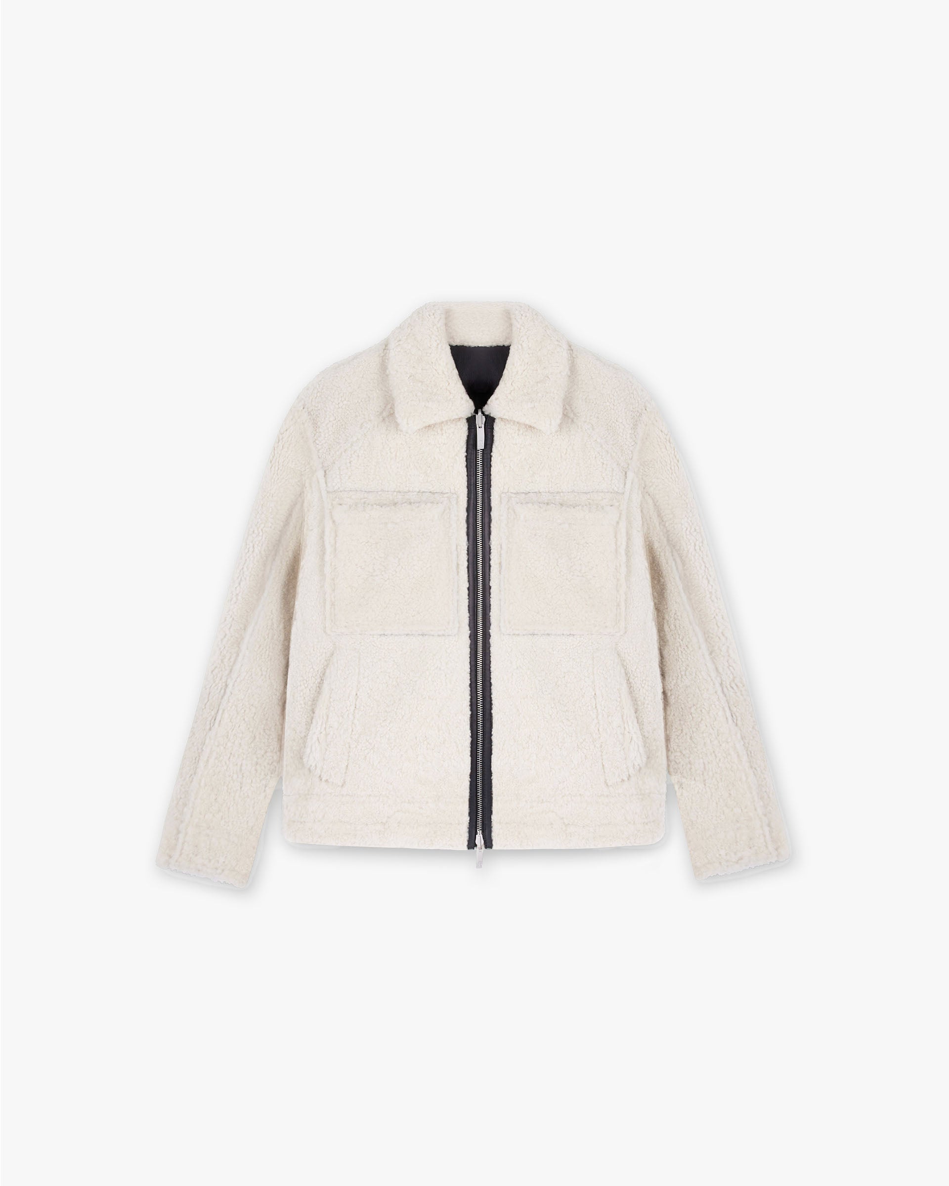 Back product image of a mens black reversible shearling jacket on a plain white background | Reversible Shearling Jacket in Black | Shearling jacket with leather lining and patch pockets | FW24 Outerwear | Represent Clo