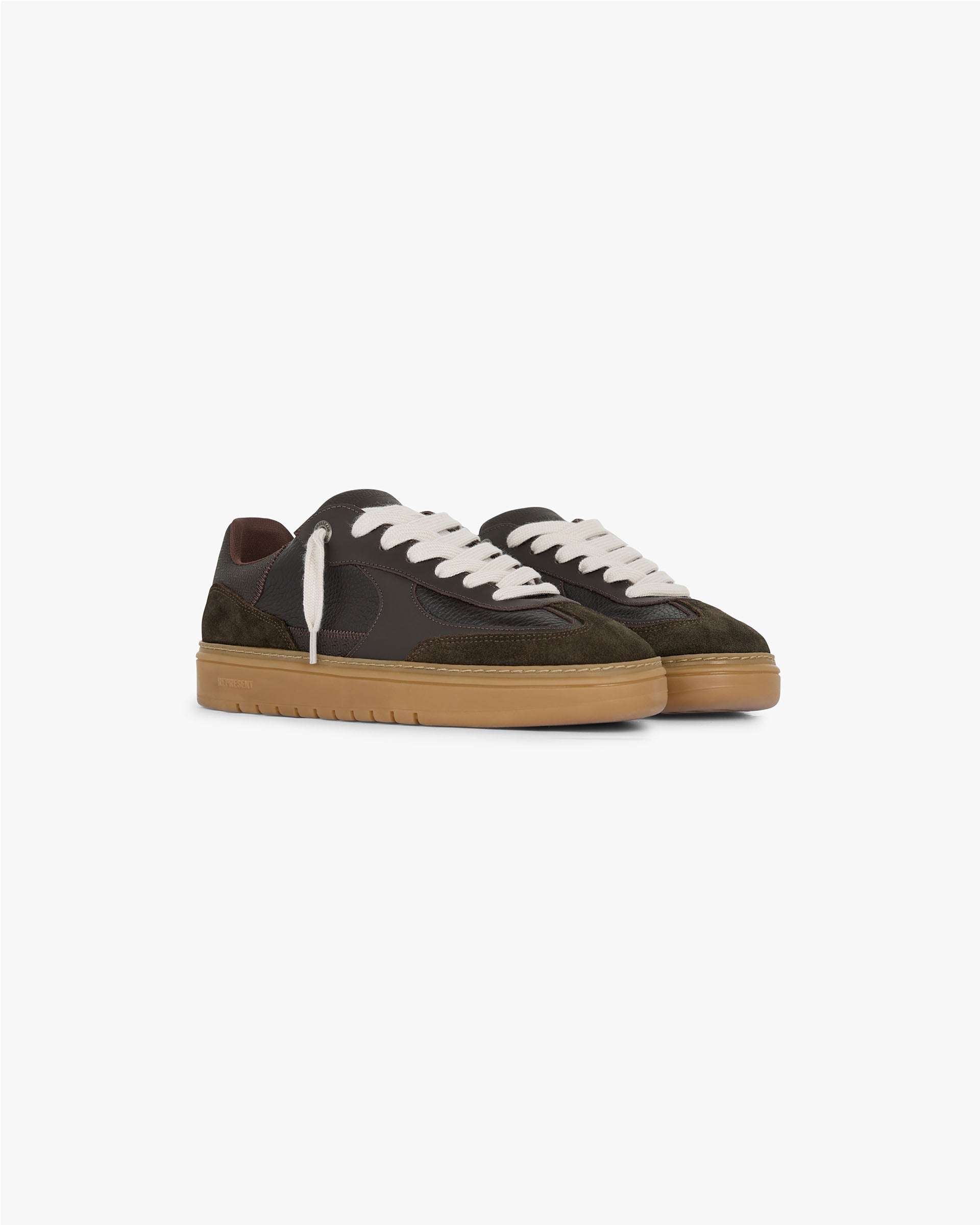 Back product image of a mens brown sneaker on a plain white background | Virtus in Chocolate Brown | Low profile sneaker with tri leather upper and gum tread | FW24 Footwear | Represent Clo