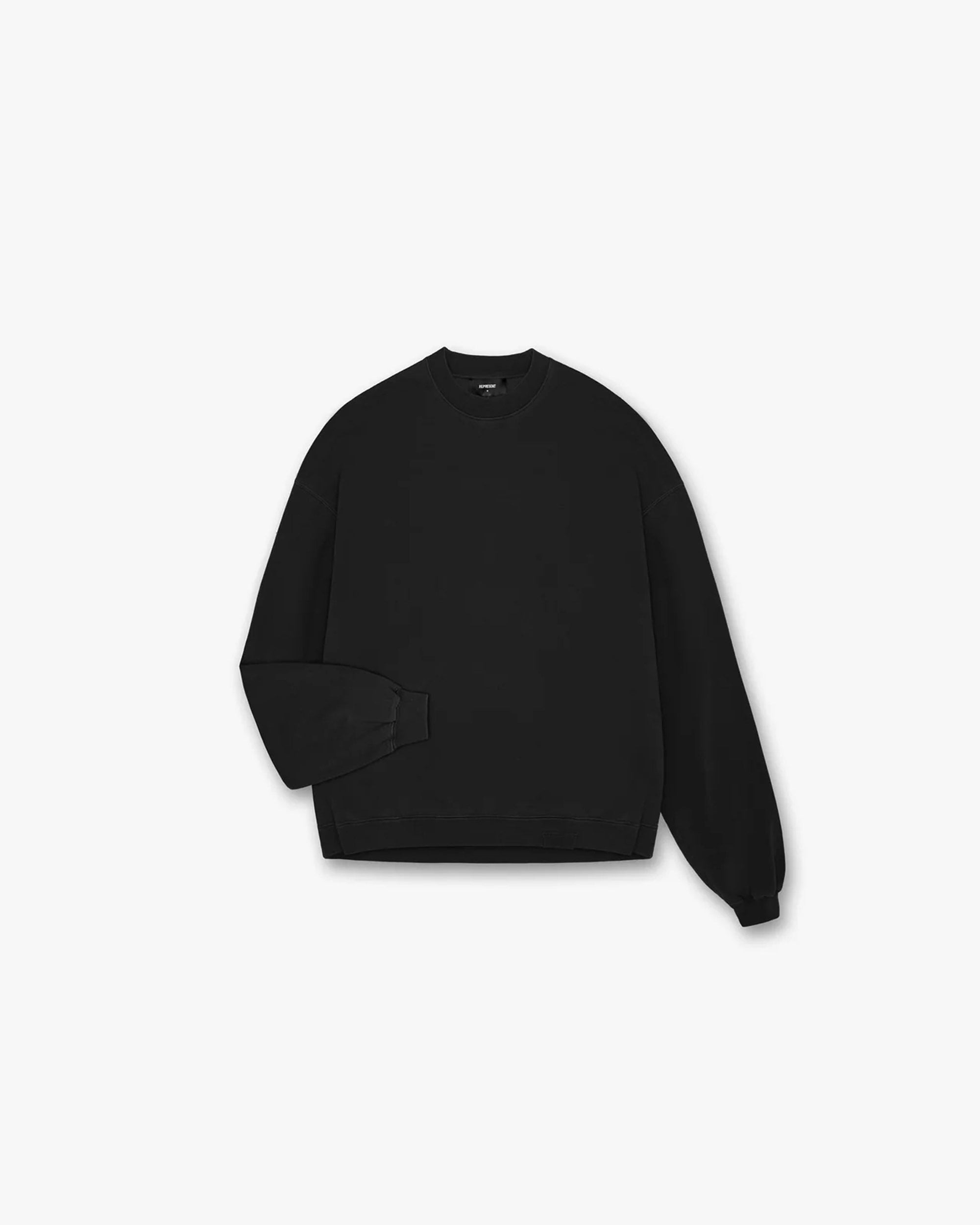 Front product image of a mens black long sleeve t-shirt on a plain white background | Initial Sweater in Jet Black | Long sleeve t-shirt with embroidered details | Initial Sweaters | Represent Clo