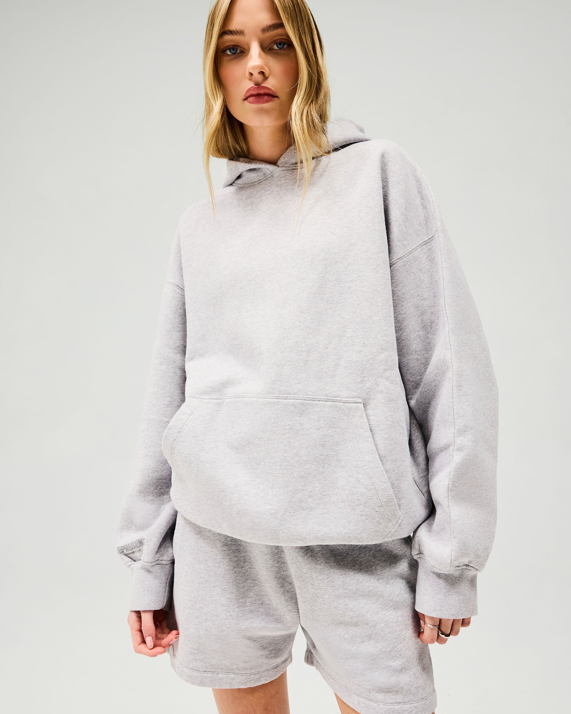 Back product image of a womens grey hoodie on a plain white background | Owners Club Boyfriend Hoodie in Grey Marl | Hoodie with ribbed hem and cuffs | Womens Owners Club Hoodies | Represent Clo