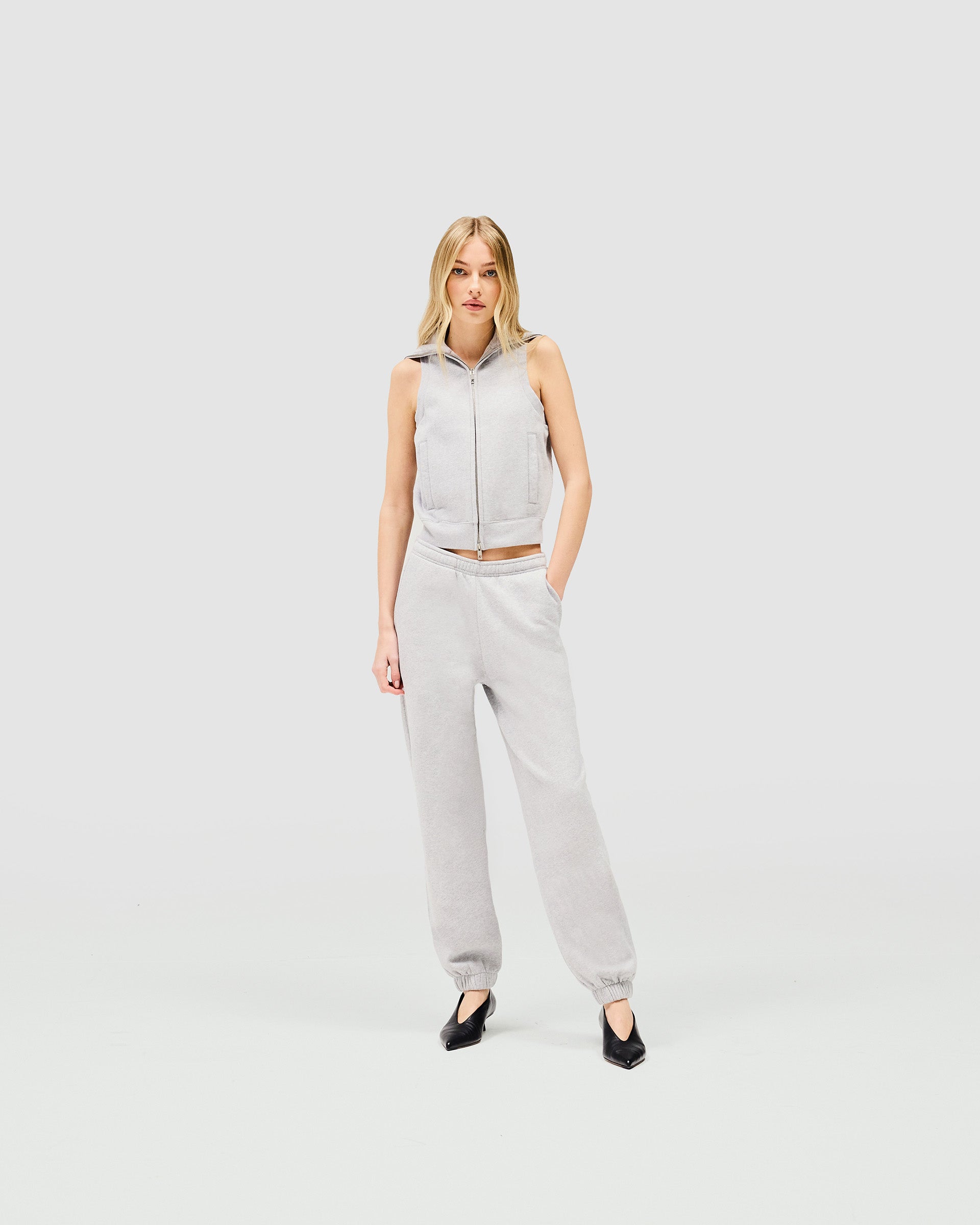 Back product image of a womens grey gilet on a plain white background | Owners Club Gilet in Grey Marl | Slim fit gilet with double ended zipper | Womens Owners Club Outerwear | Represent Clo