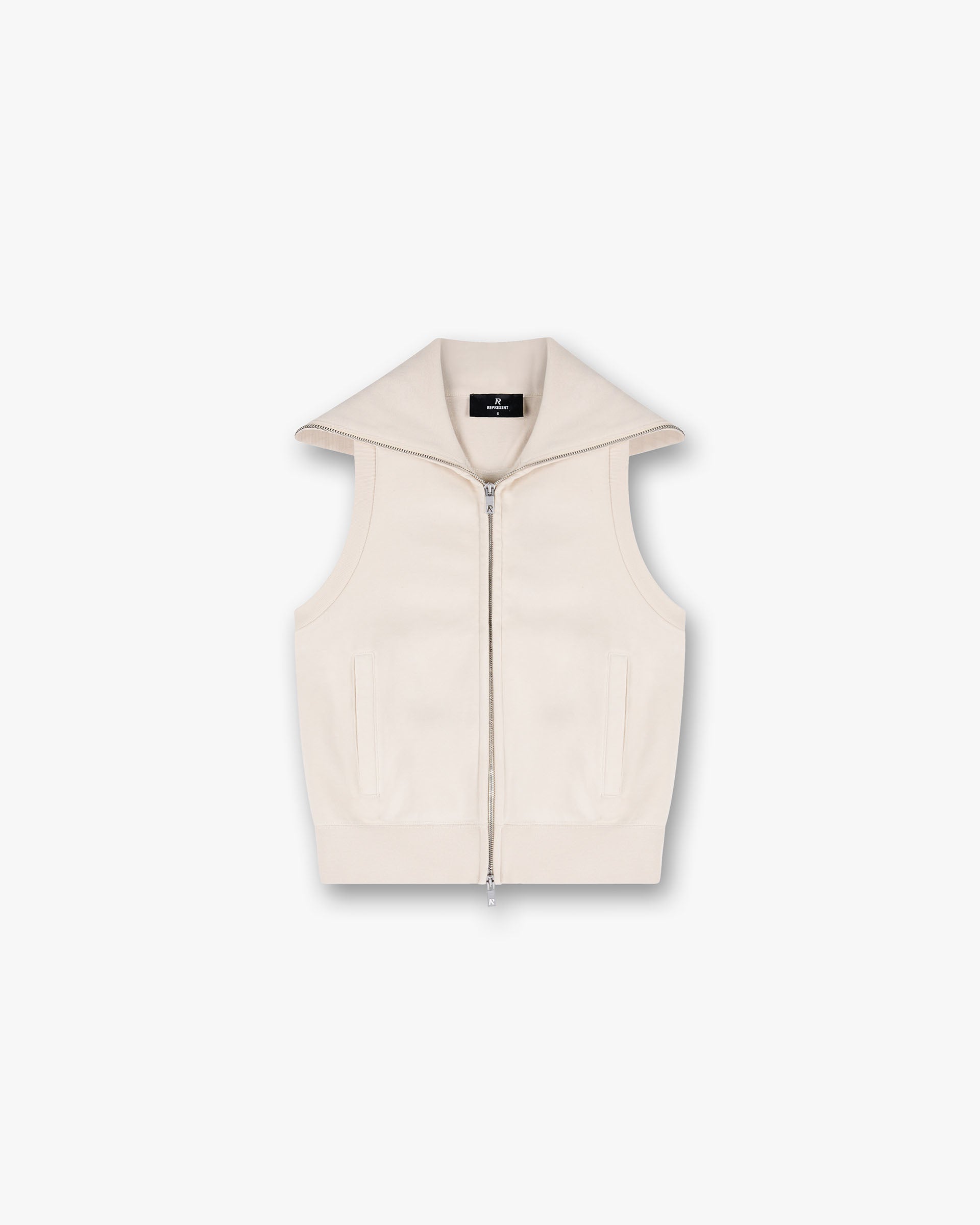 Front product image of a womens beige gilet on a plain white background | Owners Club Gilet in Oat Milk | Quilted outerwear with zip closure | Womens Owners Club Outerwear | Represent Clo