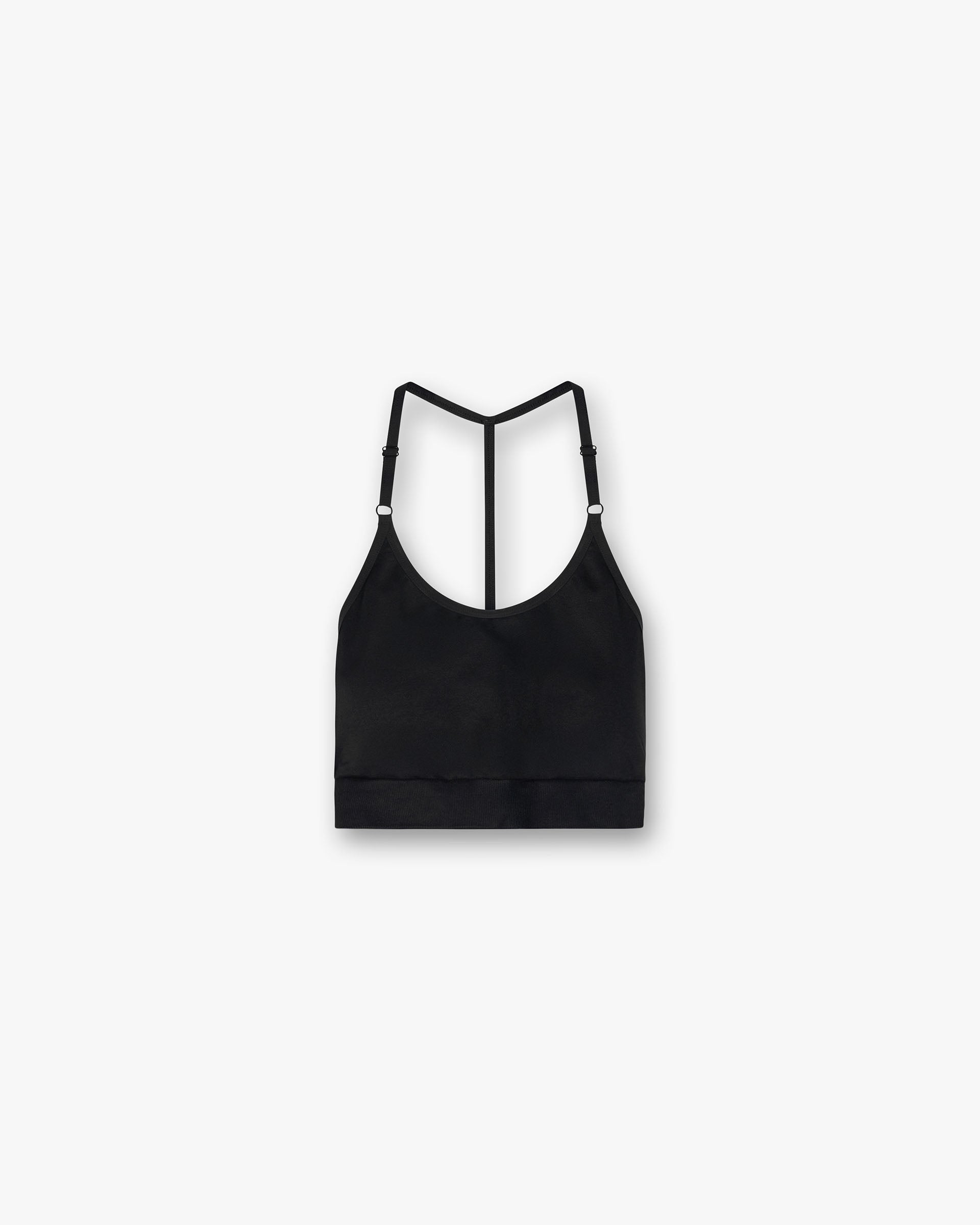 Front product image of a womens black seamless bra on a plain white background | Owners Club Seamless Low Impact Bra in Jet Black | Low impact seamless bra | Womens Owners Club Tops | Represent Clo