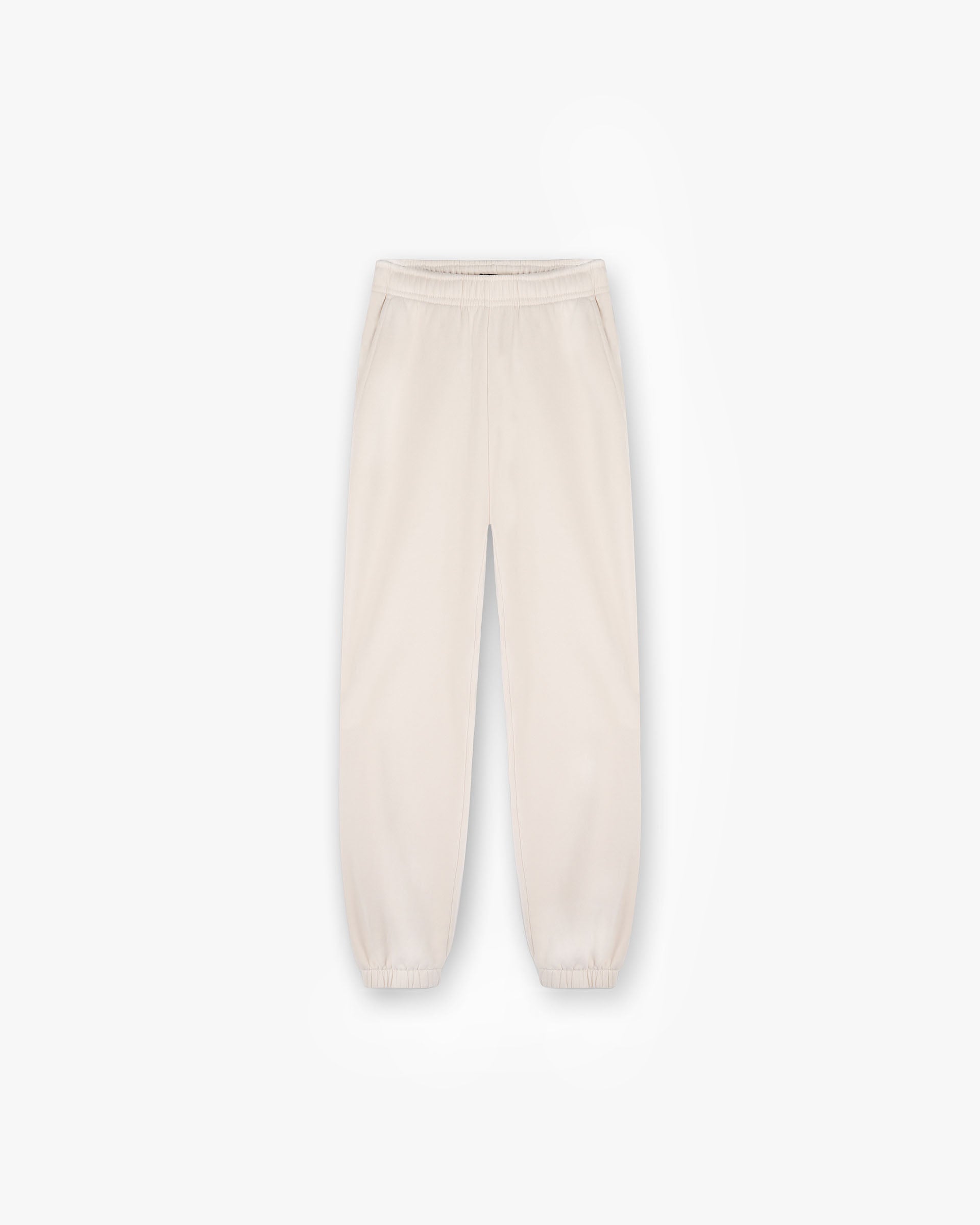 Front product image of womens oat coloured track pants on a plain white background | Owners Club Track Pant in Oat Milk | Track pants with elasticated waistband | Womens Owners Club Bottoms | Represent Clo