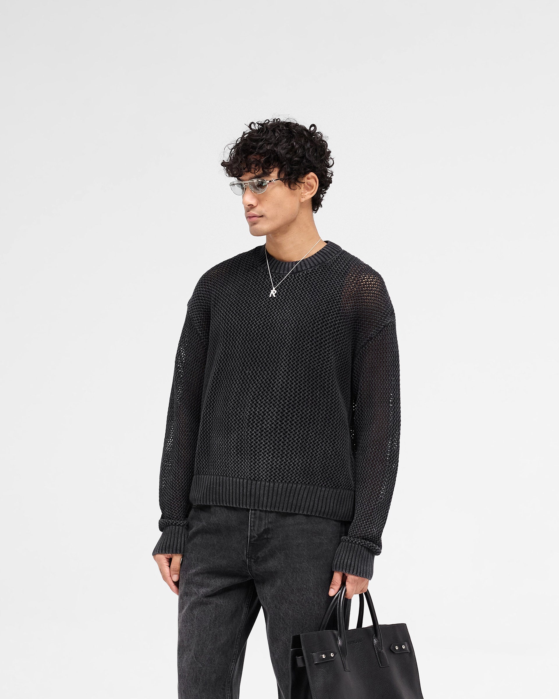 Back product image of a mens black knit sweater on a plain white background | Open Gauge Knit Sweater in Jet Black | Knit sweater with ribbed detailing and slightly oversized fit | SS25 Knitwear | Represent Clo