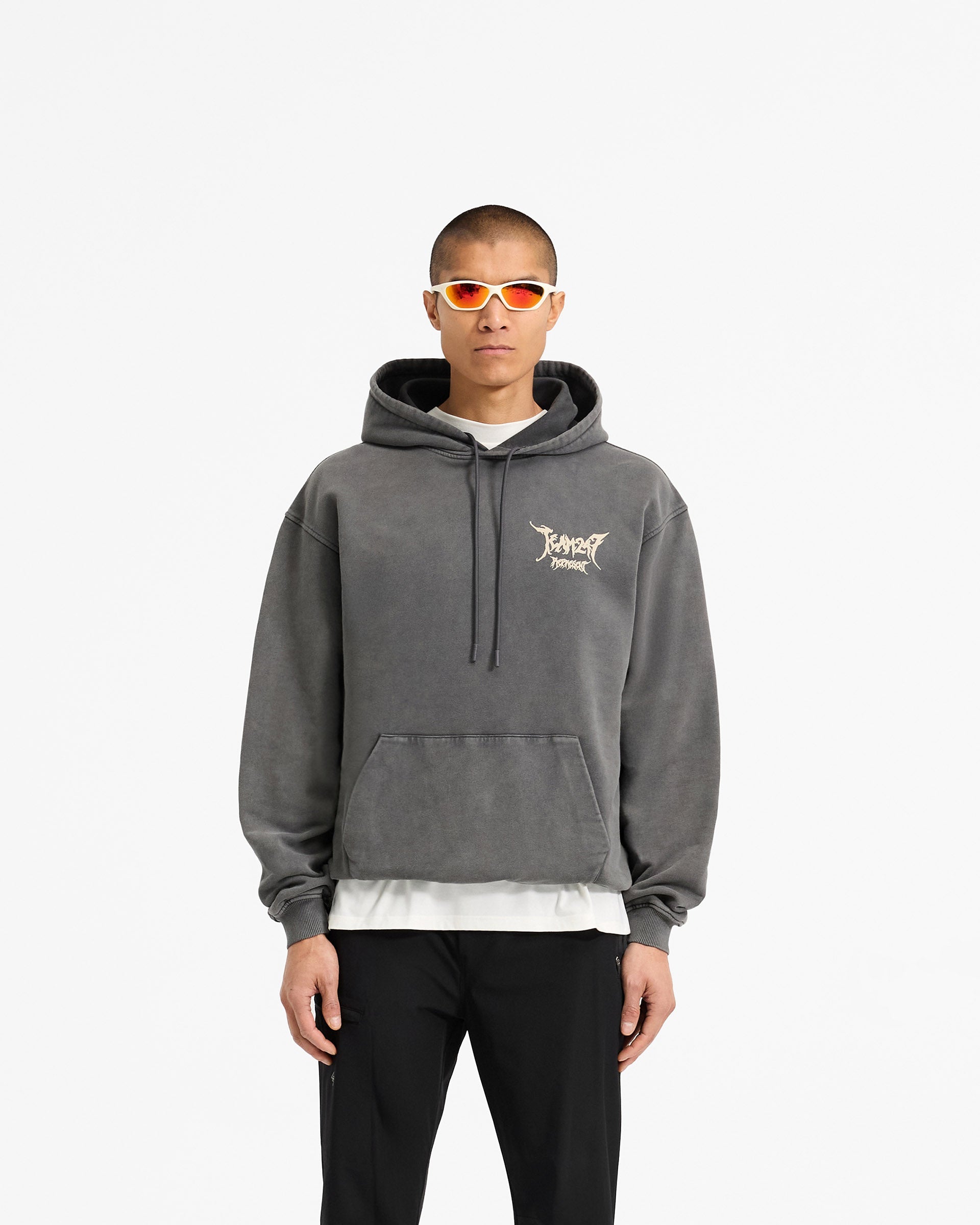 Man wearing an oversized grey hoodie on a plain white background | Team 247 X END Oversized Hoodie in Washed Grey | Hoodie with ribbed cuffs and co-branded graphics | 247 Hoodies | Represent Clo