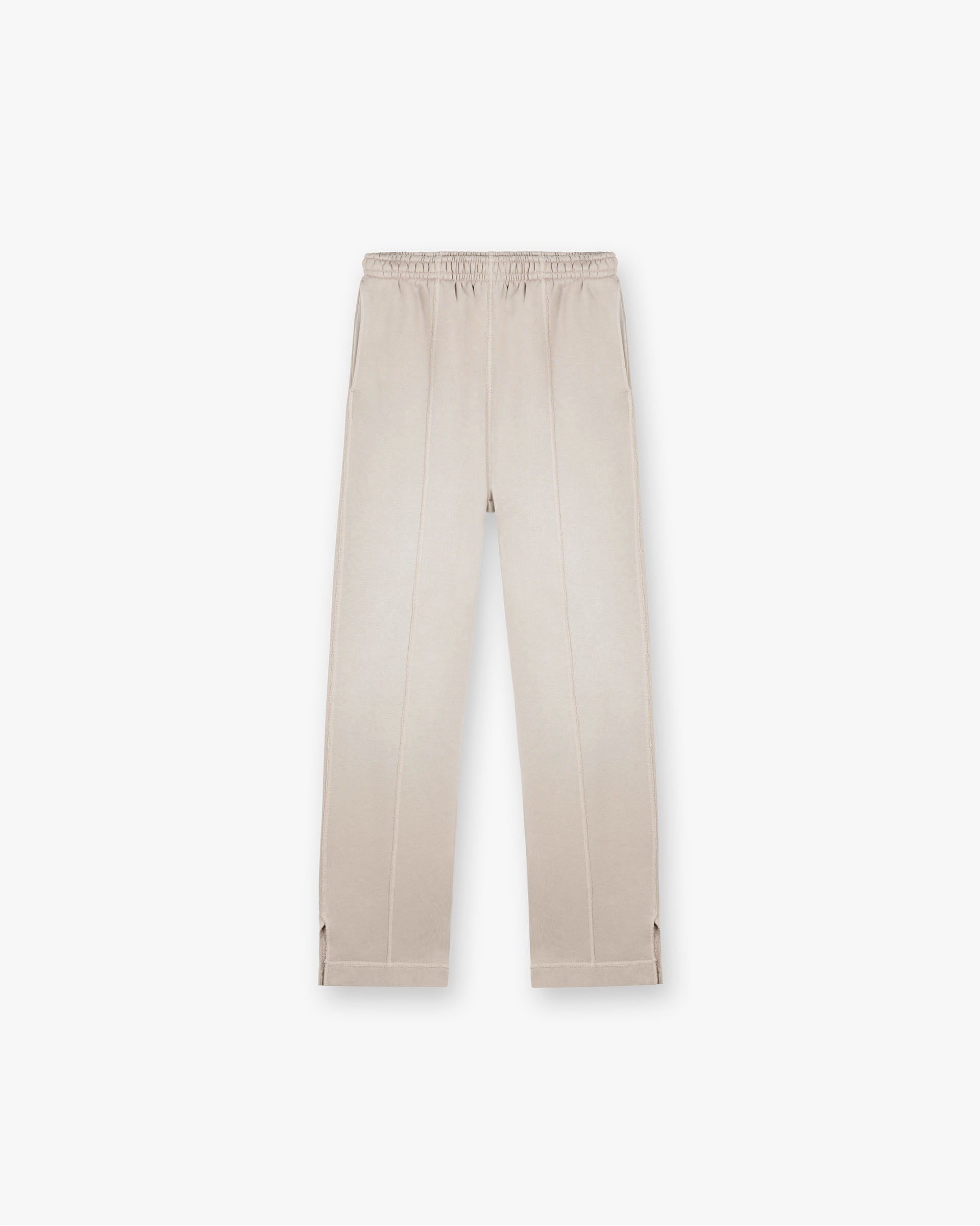 Front product image of mens oat sweatpants on a plain white background | Stepped Hem Sweatpants in Oat | Oversized fit sweatpants with stepped hems | FW24 Pants | Represent Clo