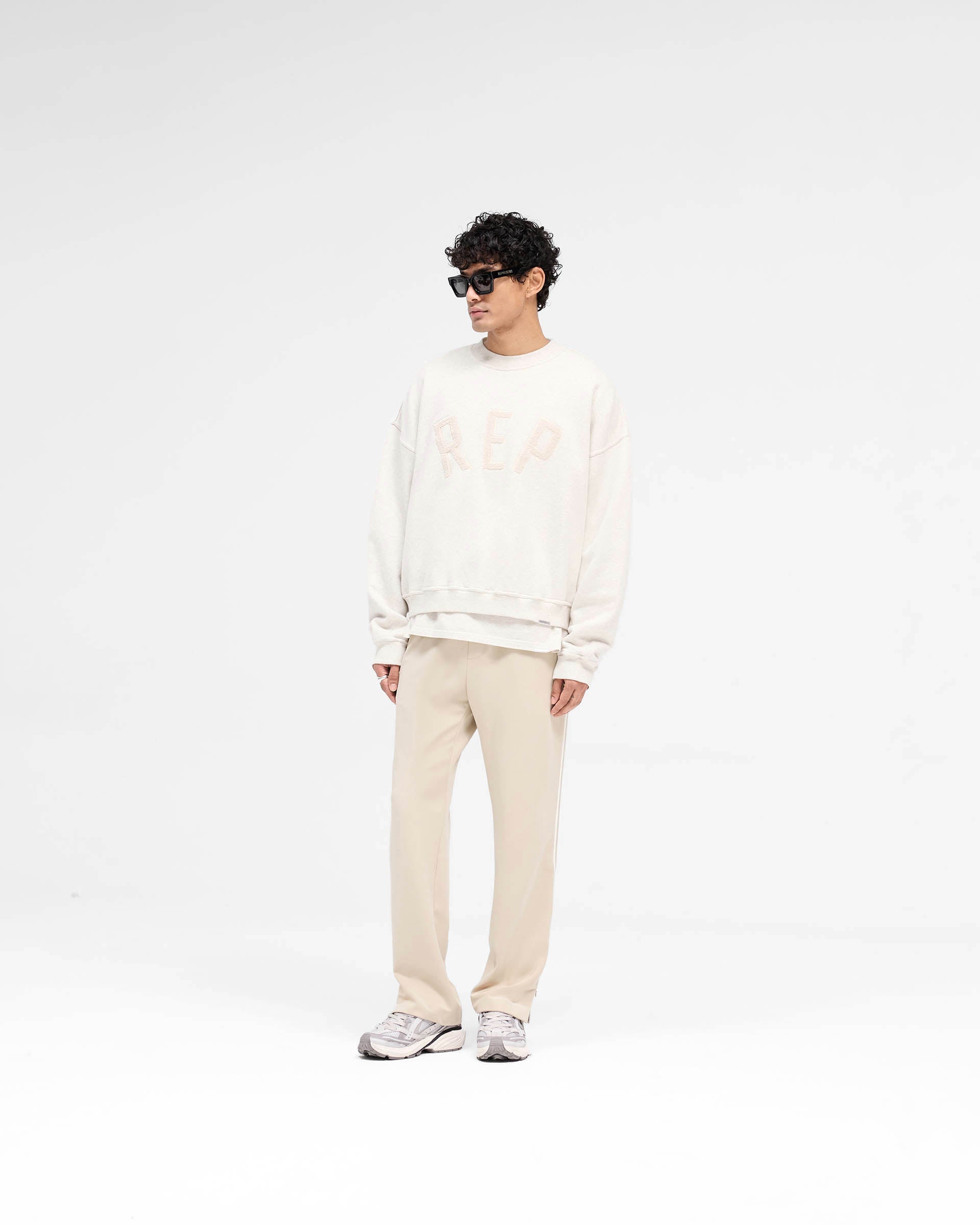 Rep Applique Sweater - Cream Marl