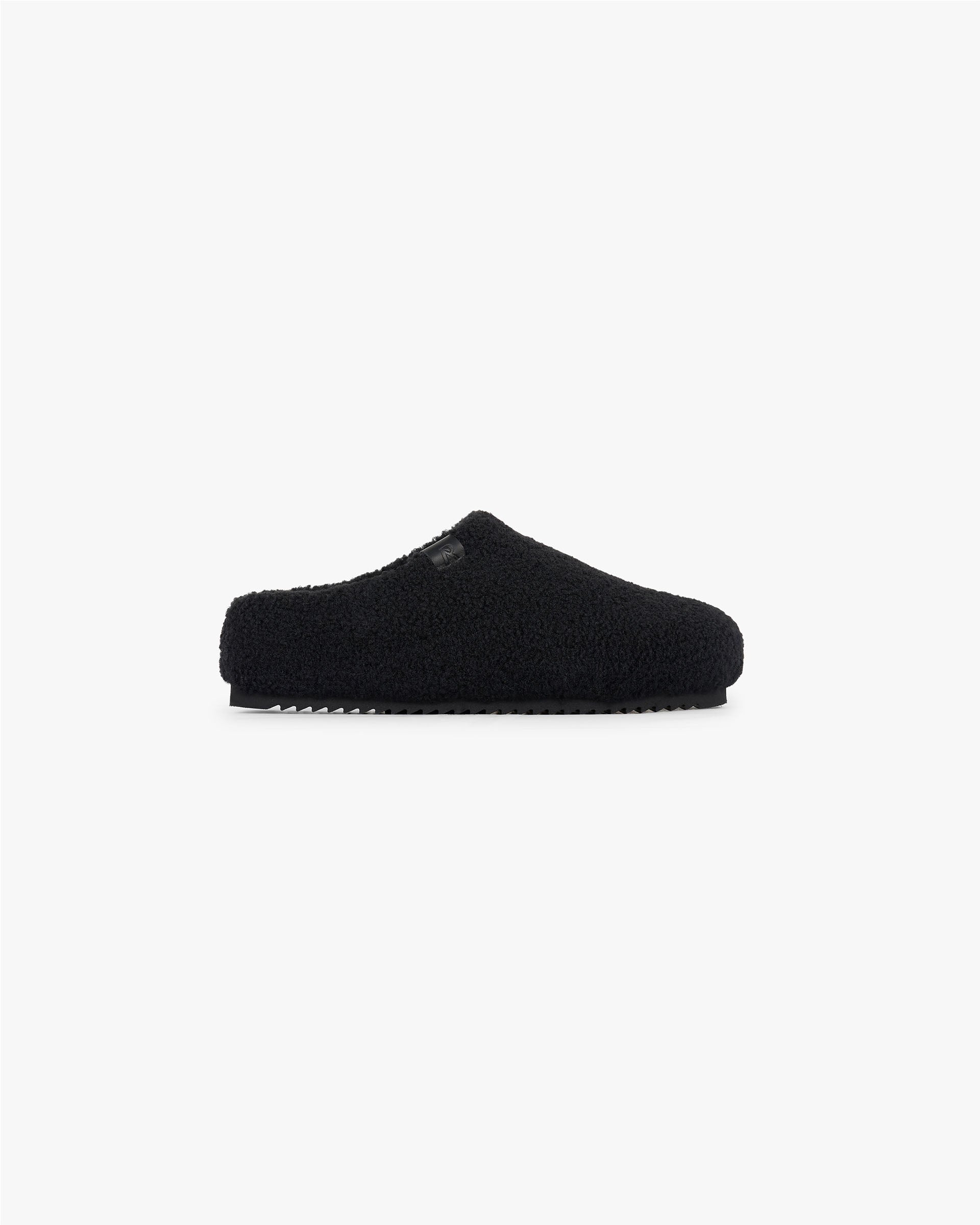Front product image of a mens black trainer on a plain white background | Fluffy Mule in Black | Low top leather trainers with suede and padded collar | FW24 Footwear | Represent Clo