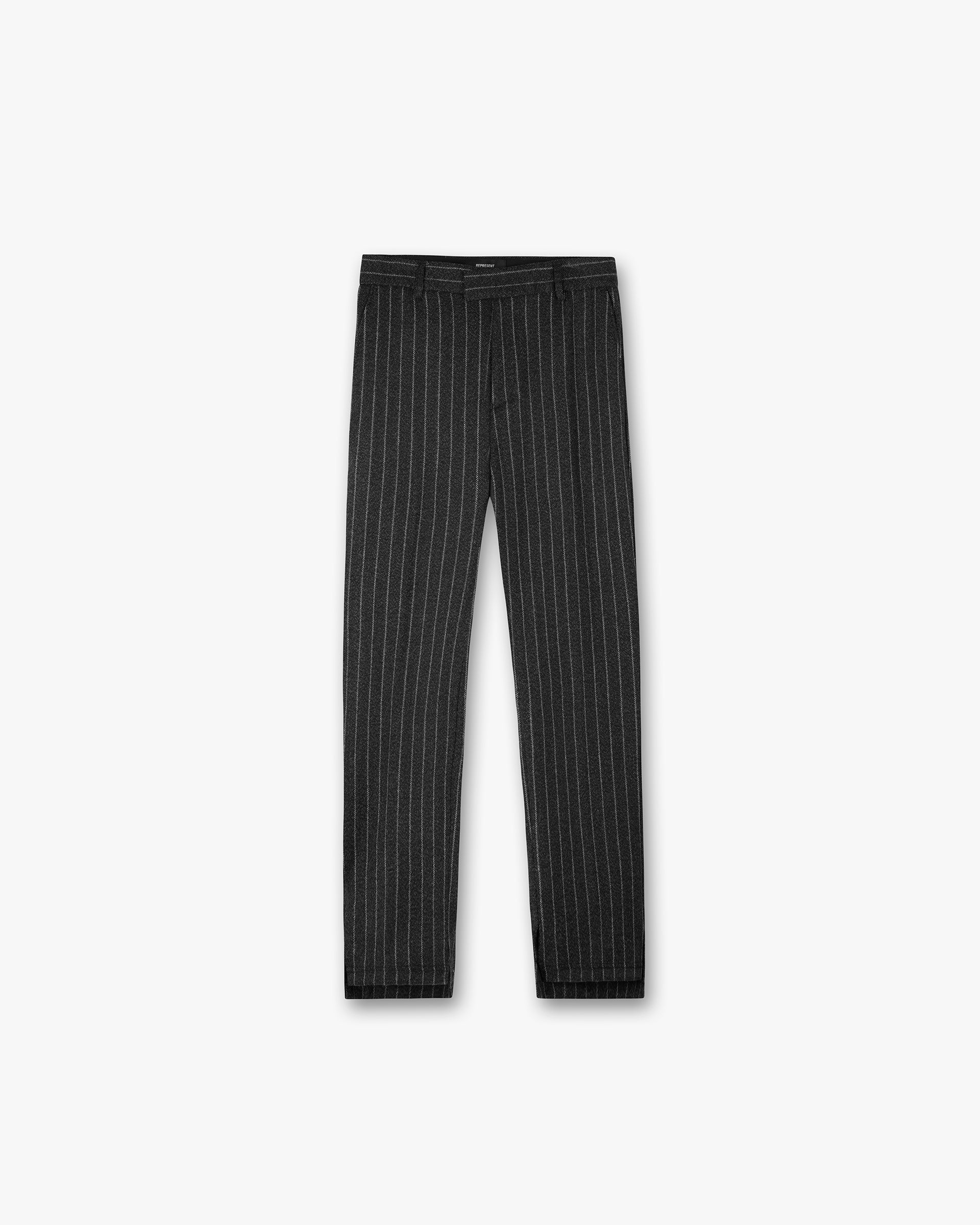 Front product image of mens black pinstripe pants on a plain white background | Stepped Hem Pant in Black Pinstripe | Tailored pants with a unique hem design | SS24 Pants | Represent Clo