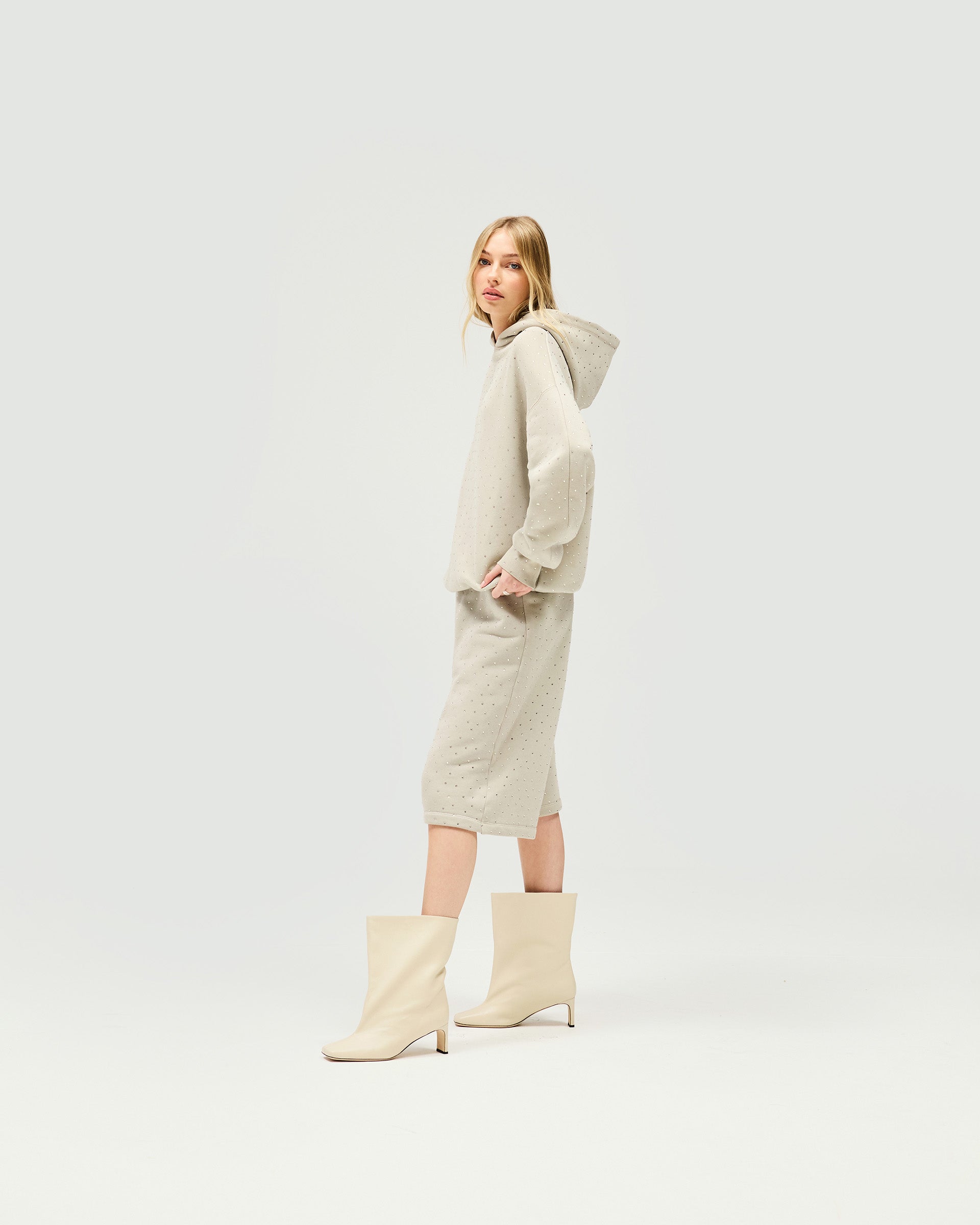 Back product image of a womens grey hoodie on a plain white background | Spark Hoodie in Storm | Oversized slouchy hoodie with silicon wash and all over hotfix | SS25 Hoodies | Represent Clo