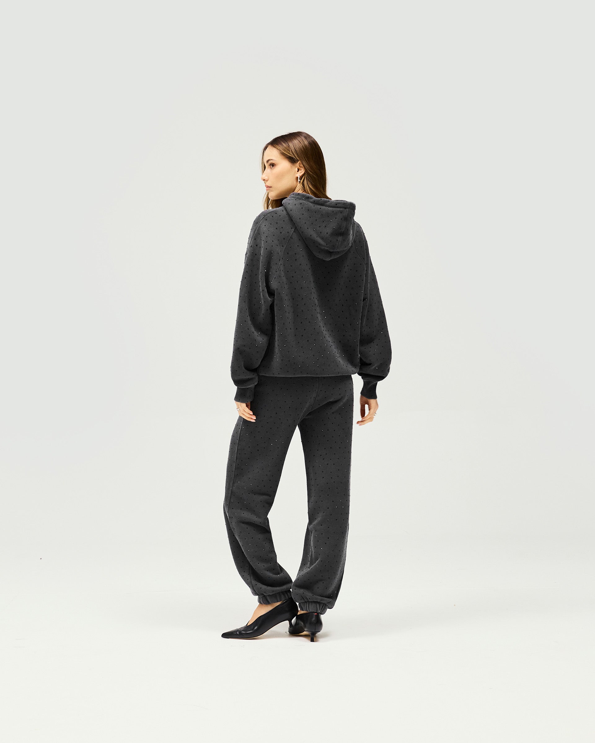 Back product image of womens grey trackpants on a plain white background | Spark Trackpant in Washed Grey | Heavy hotfix jogger style without pockets | Womens SS25 Bottoms | Represent Clo