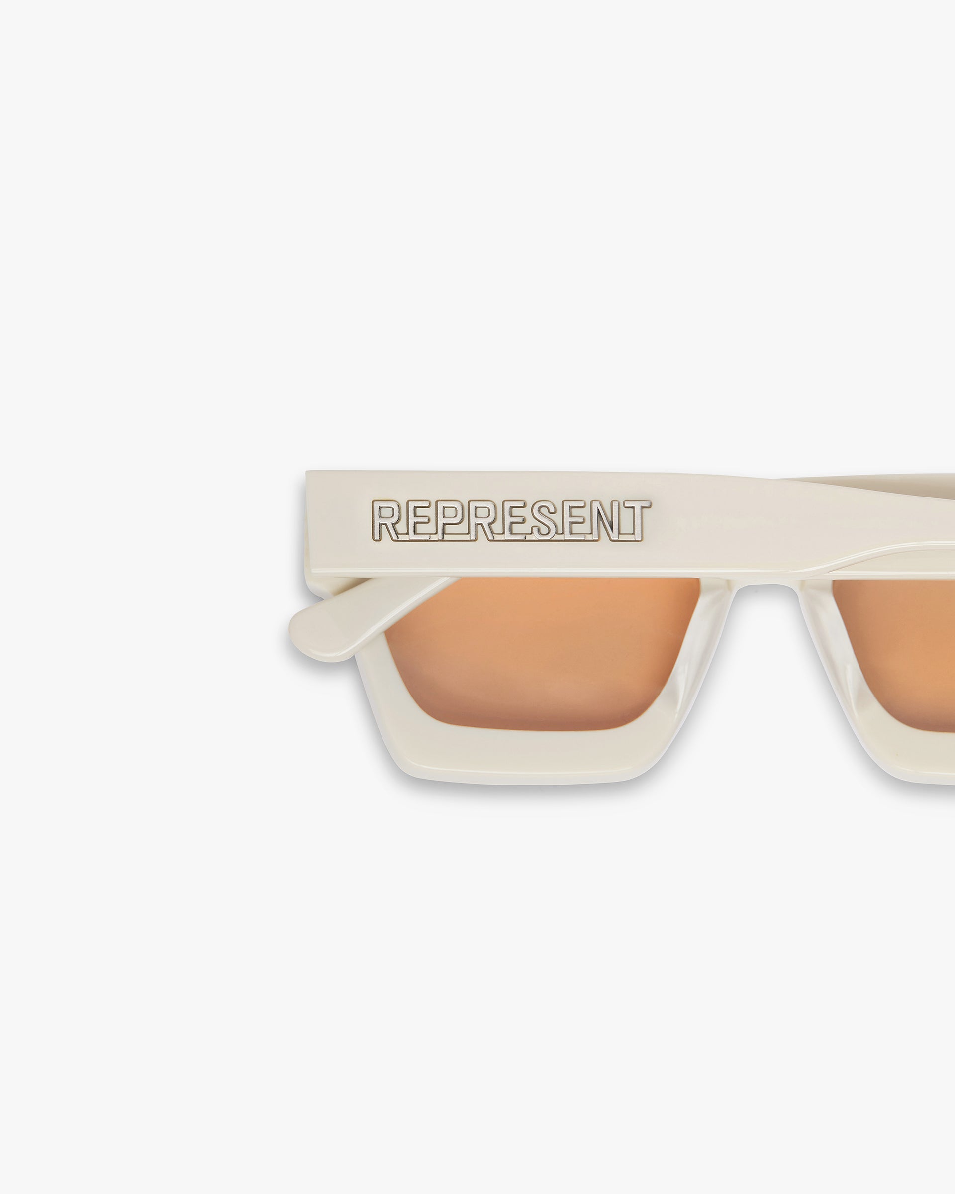 Close-up product image of off white sunglasses on a plain white background | Represent California Sunglasses in Off White | Italian made sunglasses with tinted lenses | SS24 Accessories | Represent Clo