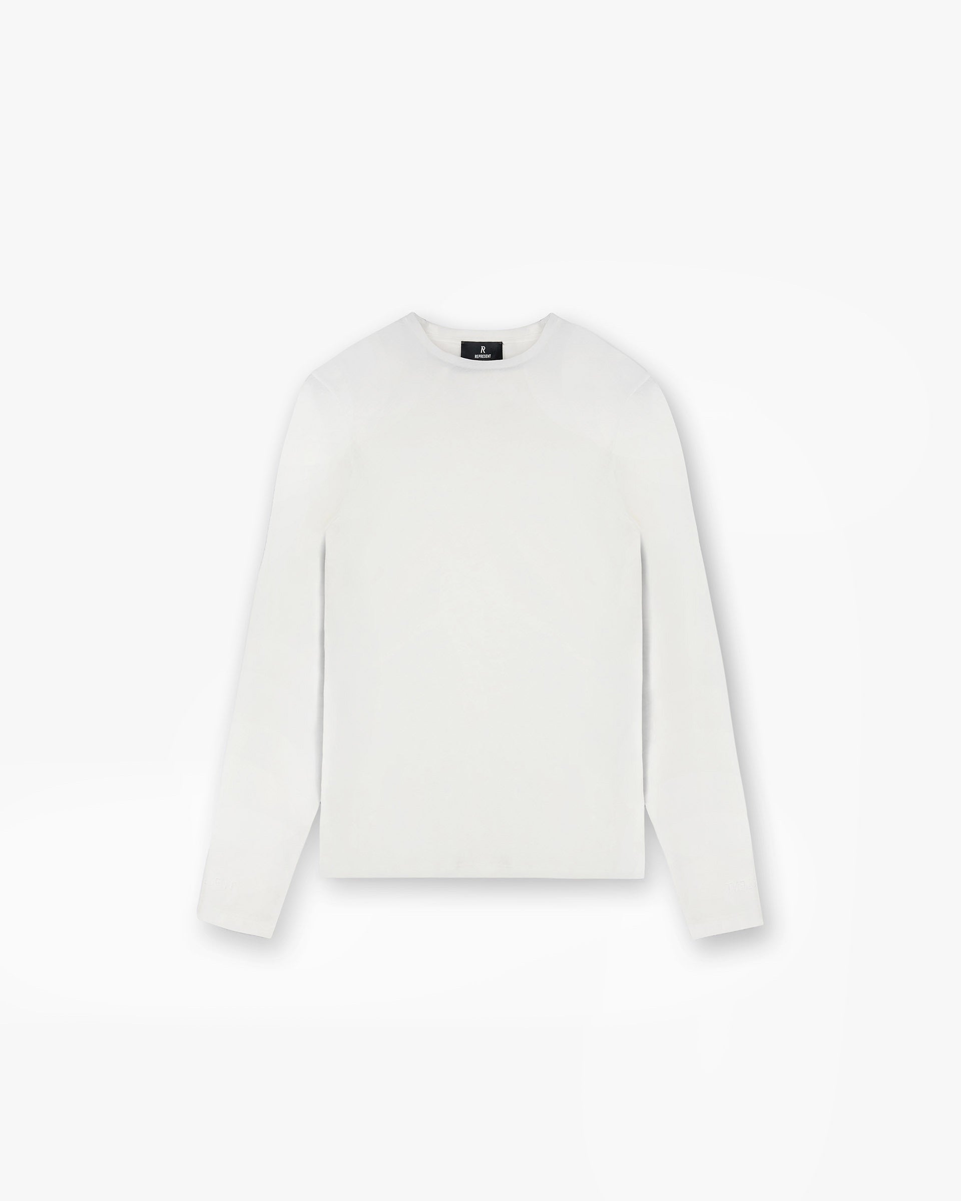 Front product image of a womens cream long sleeve top on a plain white background | Trigger Long Sleeve in Cream | Knitwear with relaxed fit | Womens SS25 Knitwear | Represent Clo