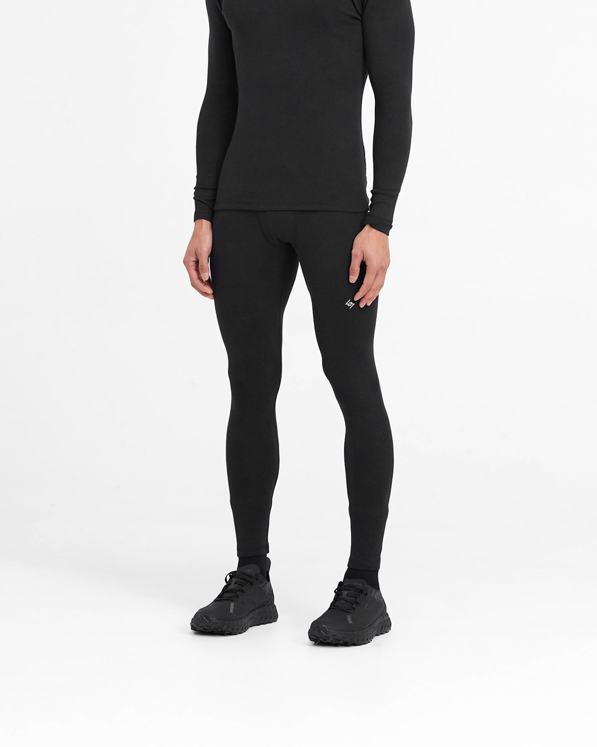 Back product image of mens black leggings on a plain white background | 247 Ribbed Legging in Black | Ribbed leggings with close fit and embroidered logo | 247 Pants | Represent Clo