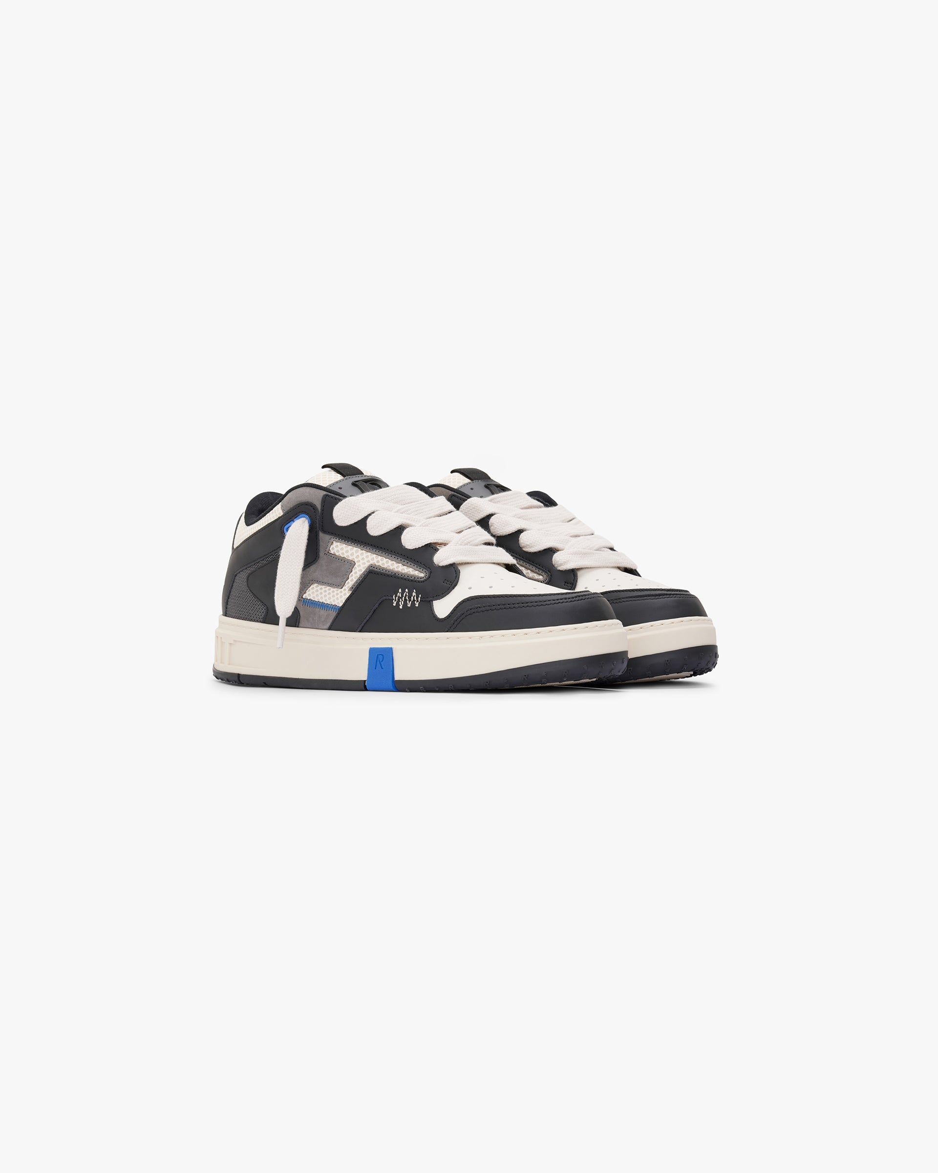 Back product image of mens black and white footwear on a plain white background | Reptor 2 in Black Vintage White | Leather and nubuck footwear with nylon panels | FW24 Footwear | Represent Clo