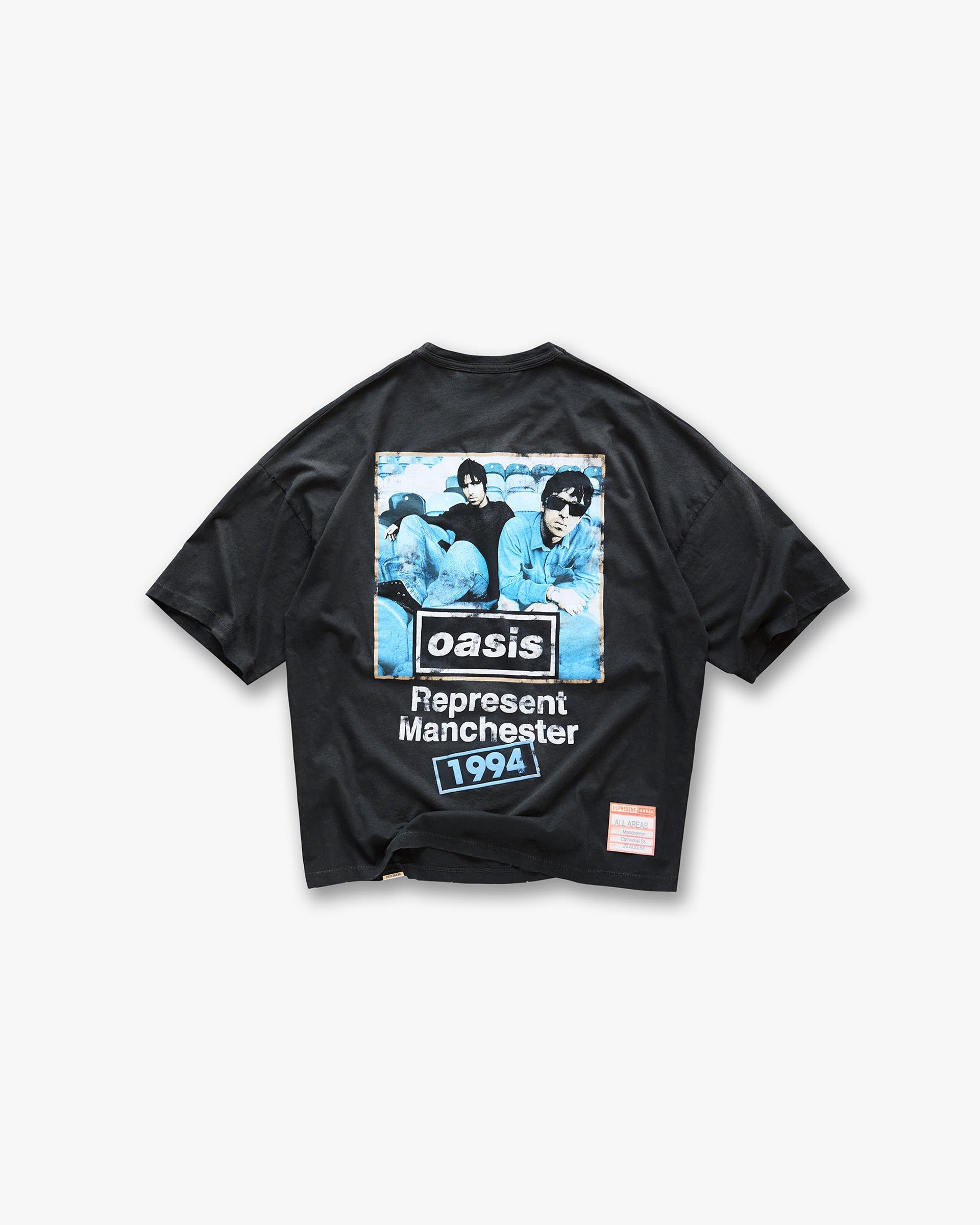 Back product image of a mens black t-shirt on a plain white background | Represent X Oasis Maine Road T-Shirt in Washed Black | Oversized boxy fit t-shirt with distressed details | FW24 T-Shirts | Represent Clo