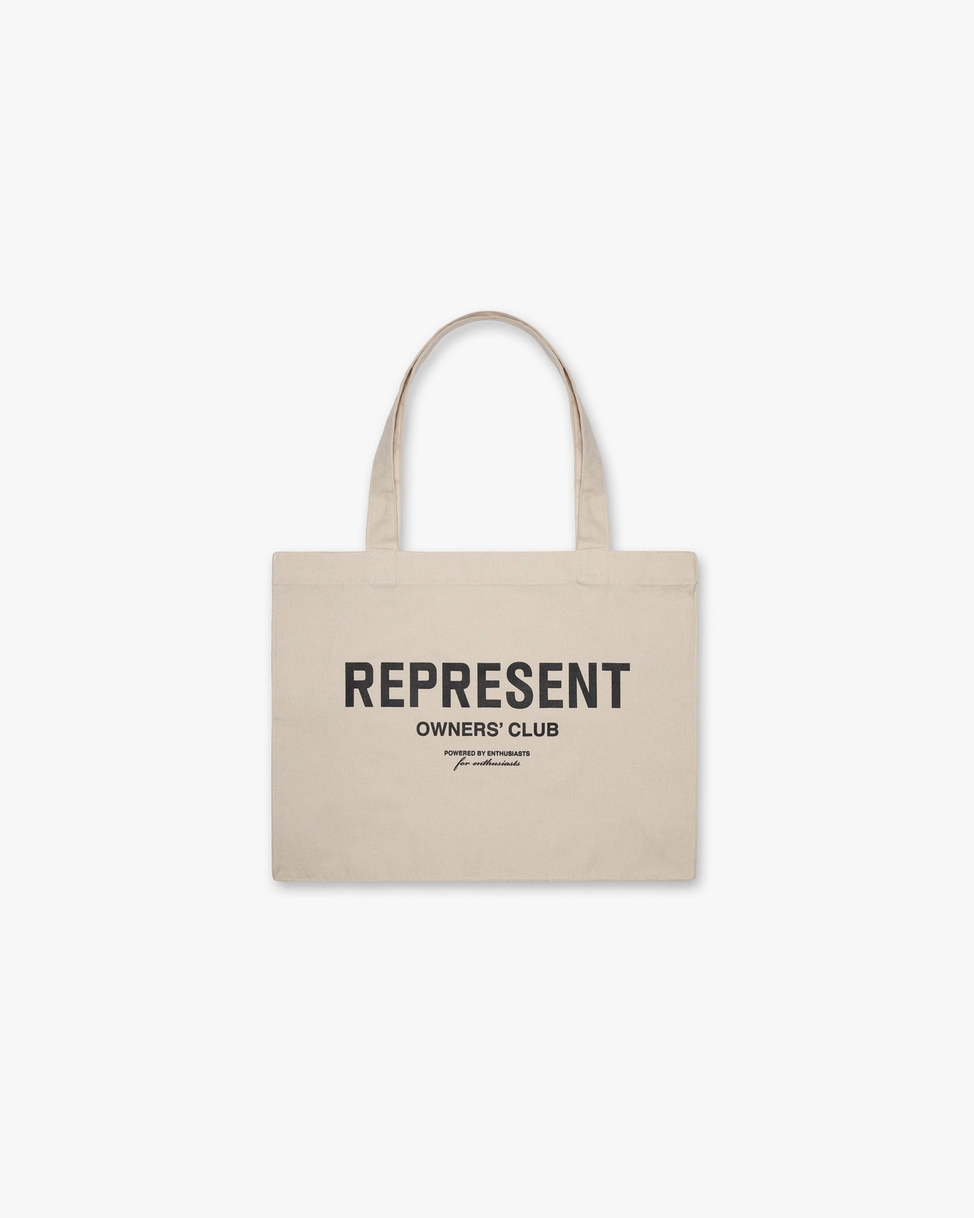 Front product image of a mens white tote bag on a plain white background | Owners Club Tote Bag in Vintage White and Black | Spacious tote bag with black branding | Owners Club Accessories | Represent Clo